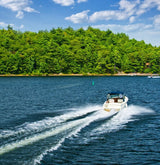 Family in a boat out on the lake