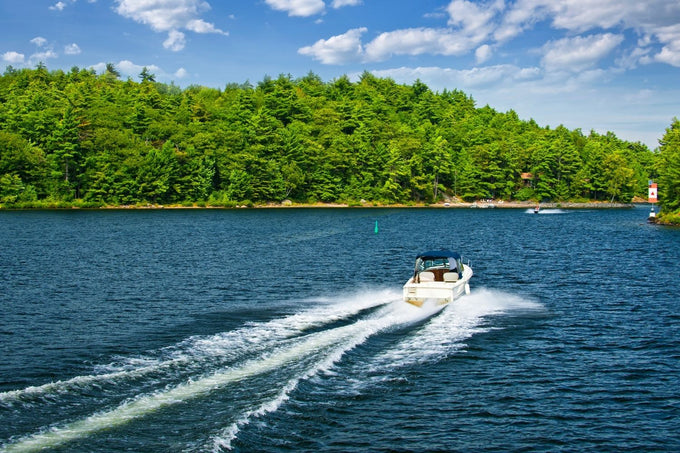 Family in a boat out on the lake