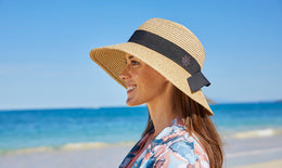 Woman wearing a sun hat that fits her face shape