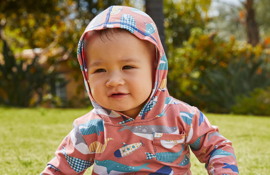 little boy in UPF 50+ clothing