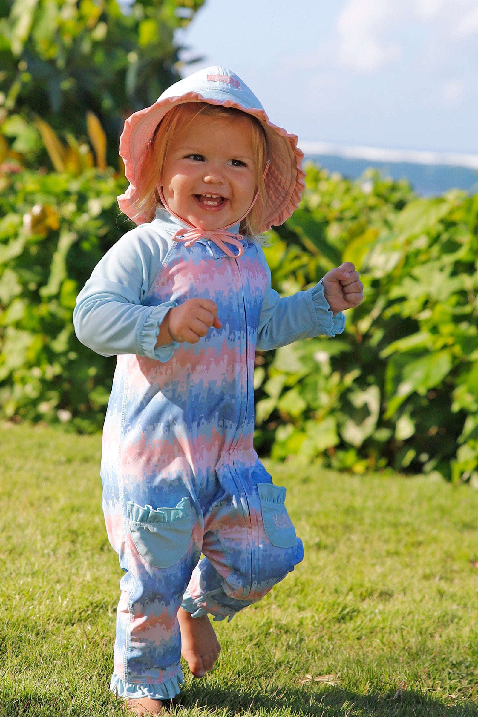 baby girl running in one piece sun & swim suit in sandcastle dreams|sandcastle-dreams