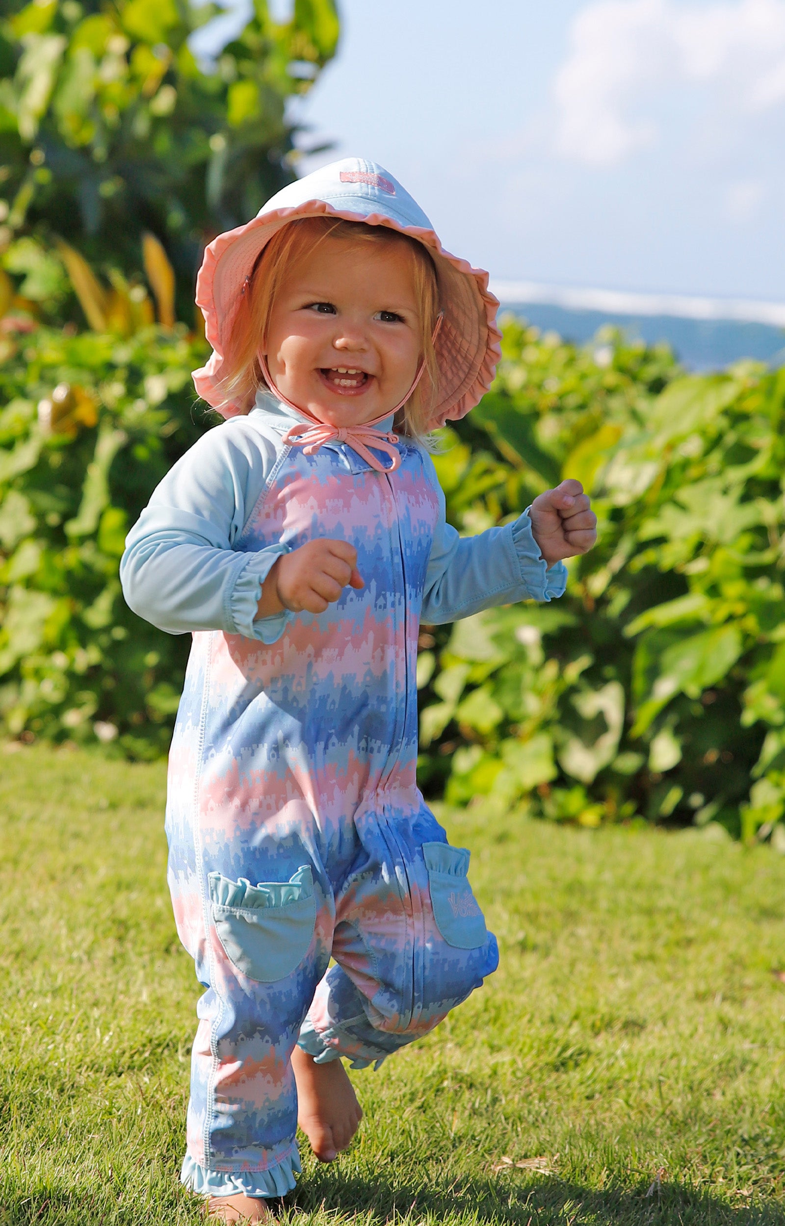 baby girl running in one piece sun & swim suit in sandcastle dreams|sandcastle-dreams