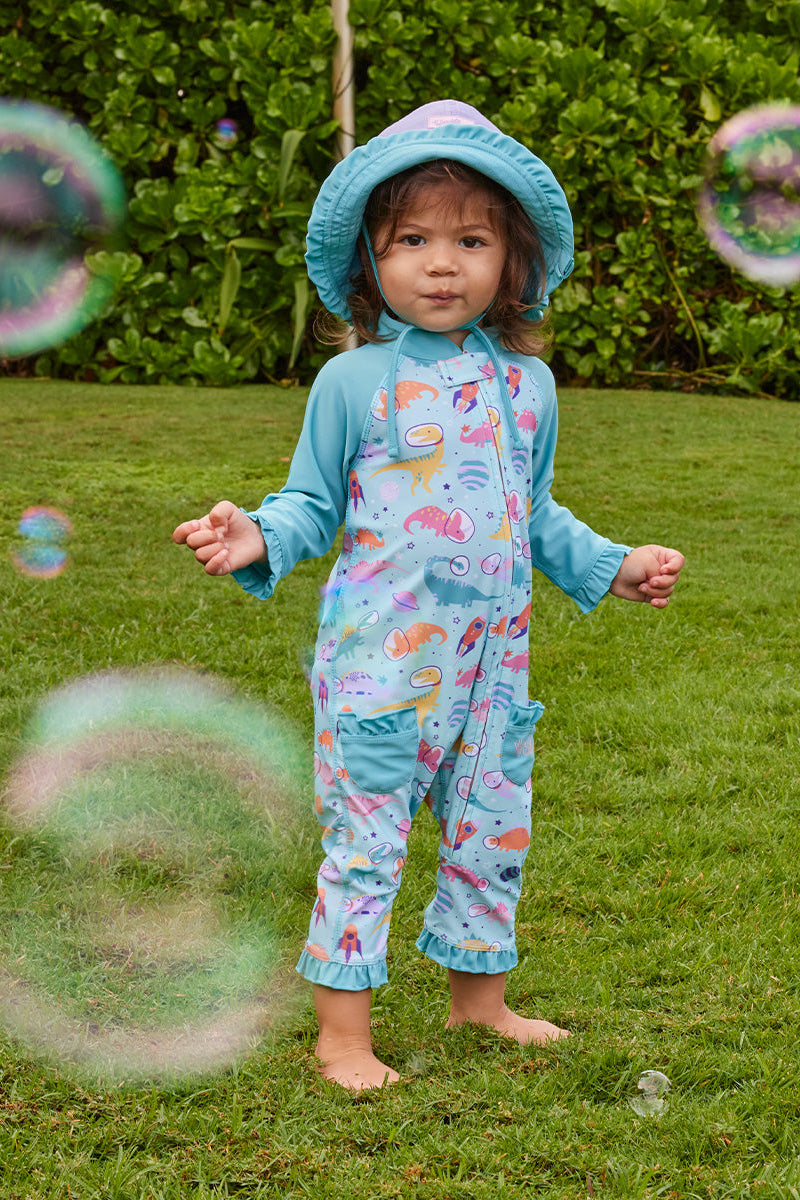 baby with bubbles in sun & swim suit|space-dinos