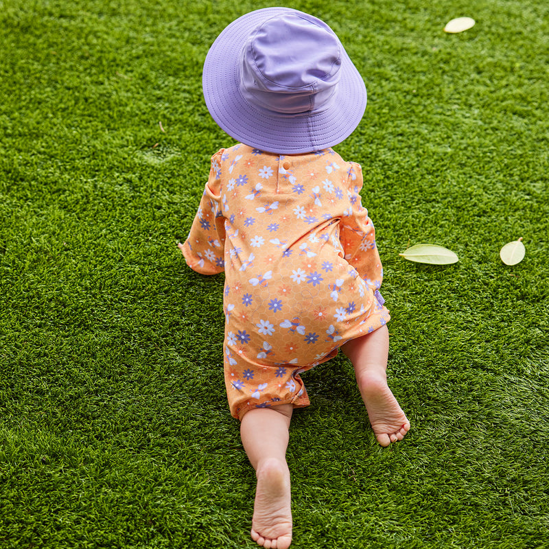 baby girl crawling in uv sunzie|bubbly-bees