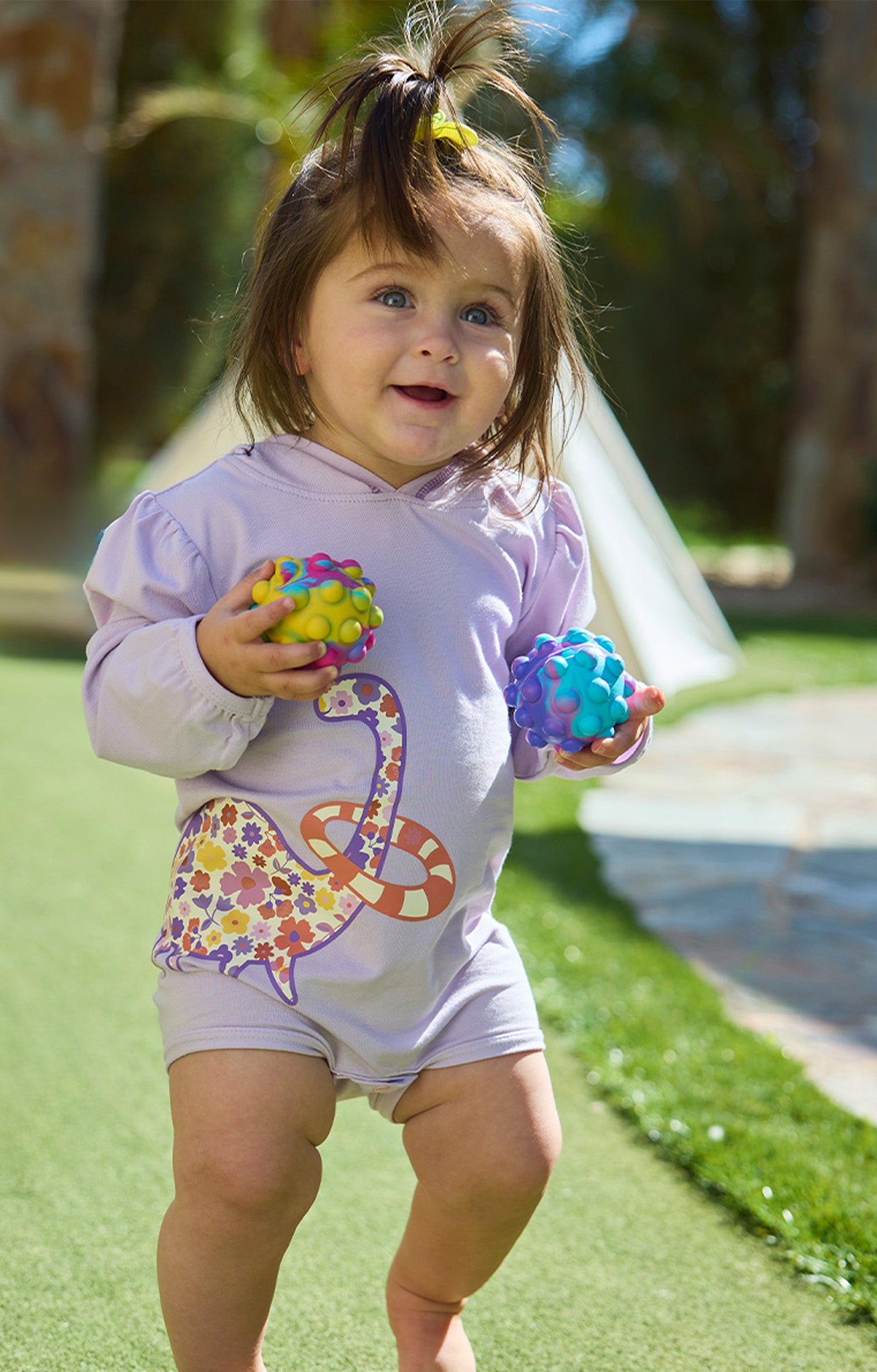baby girl running in hooded sunzie|tubin-dino