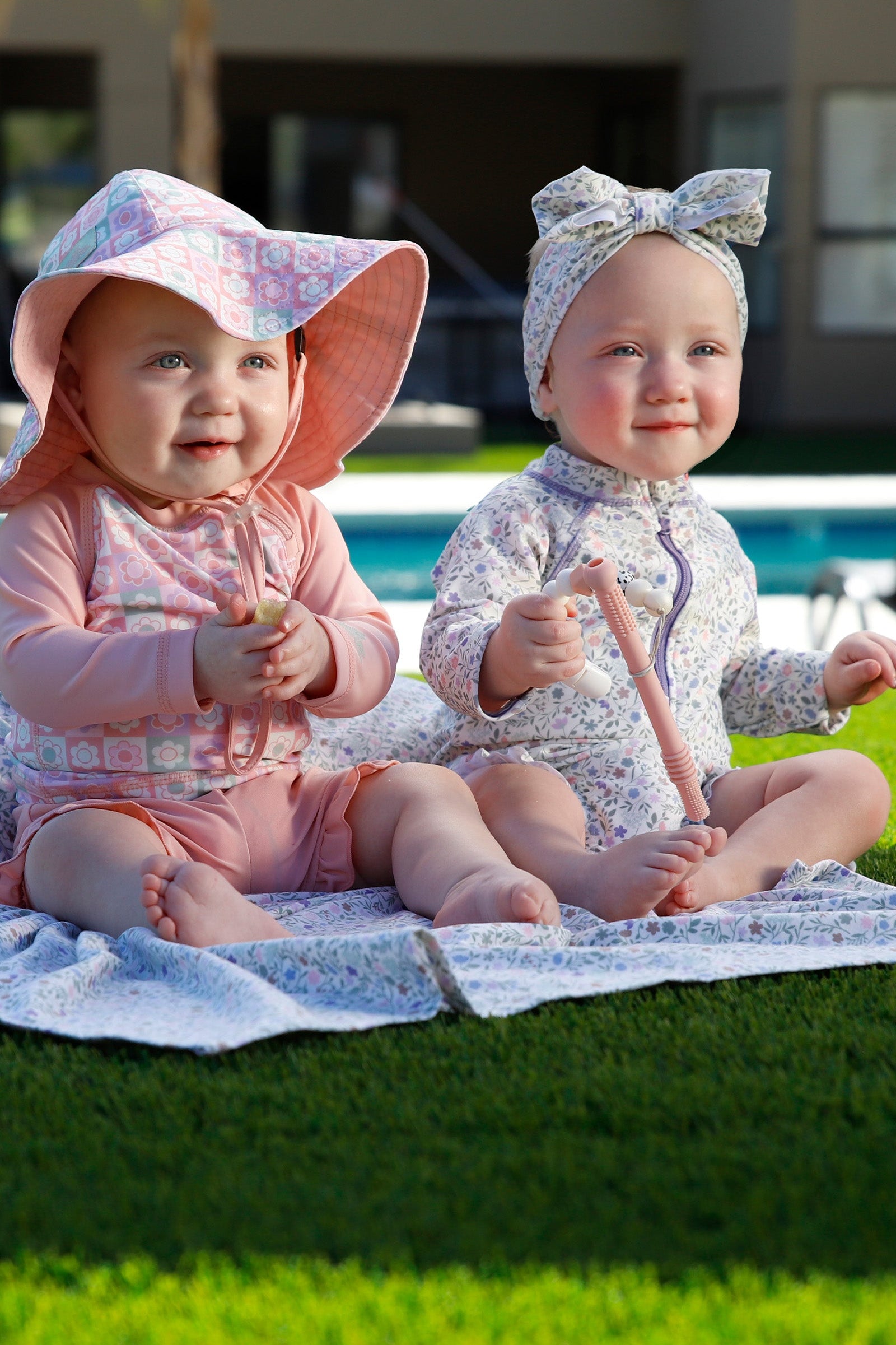 baby girl in long sleeve ruffled swim romper|sonora-meadows