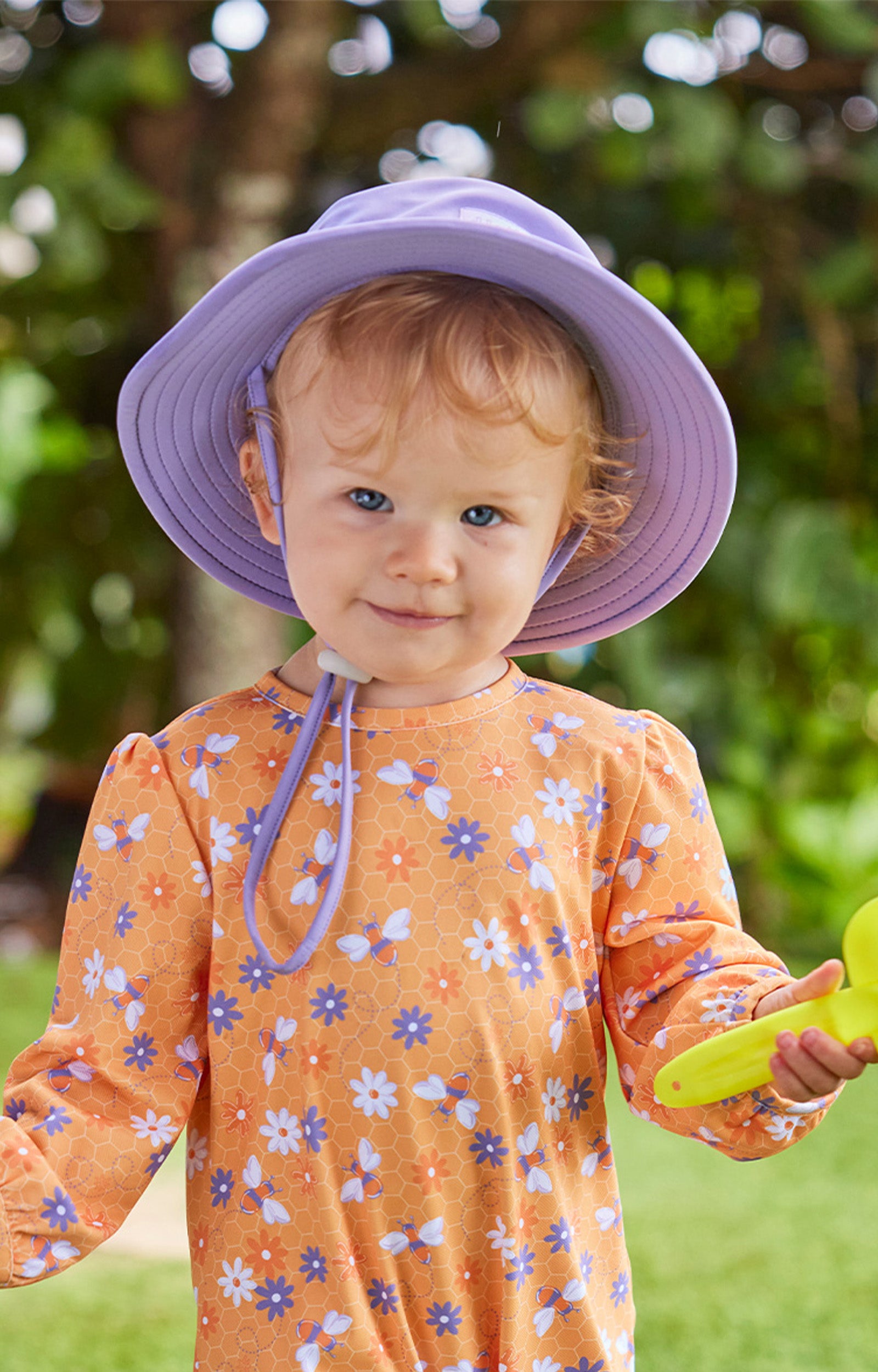 baby girl in swim hat|daybreak
