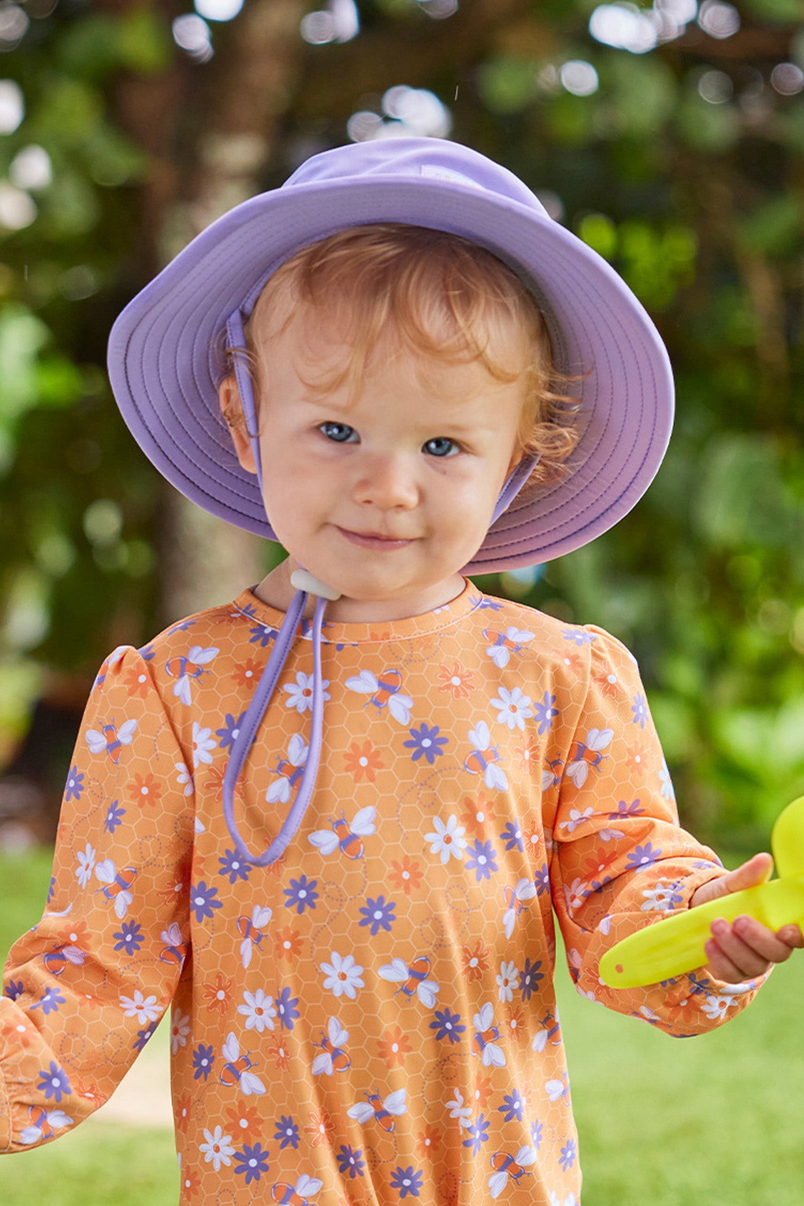 baby girl in swim hat|daybreak