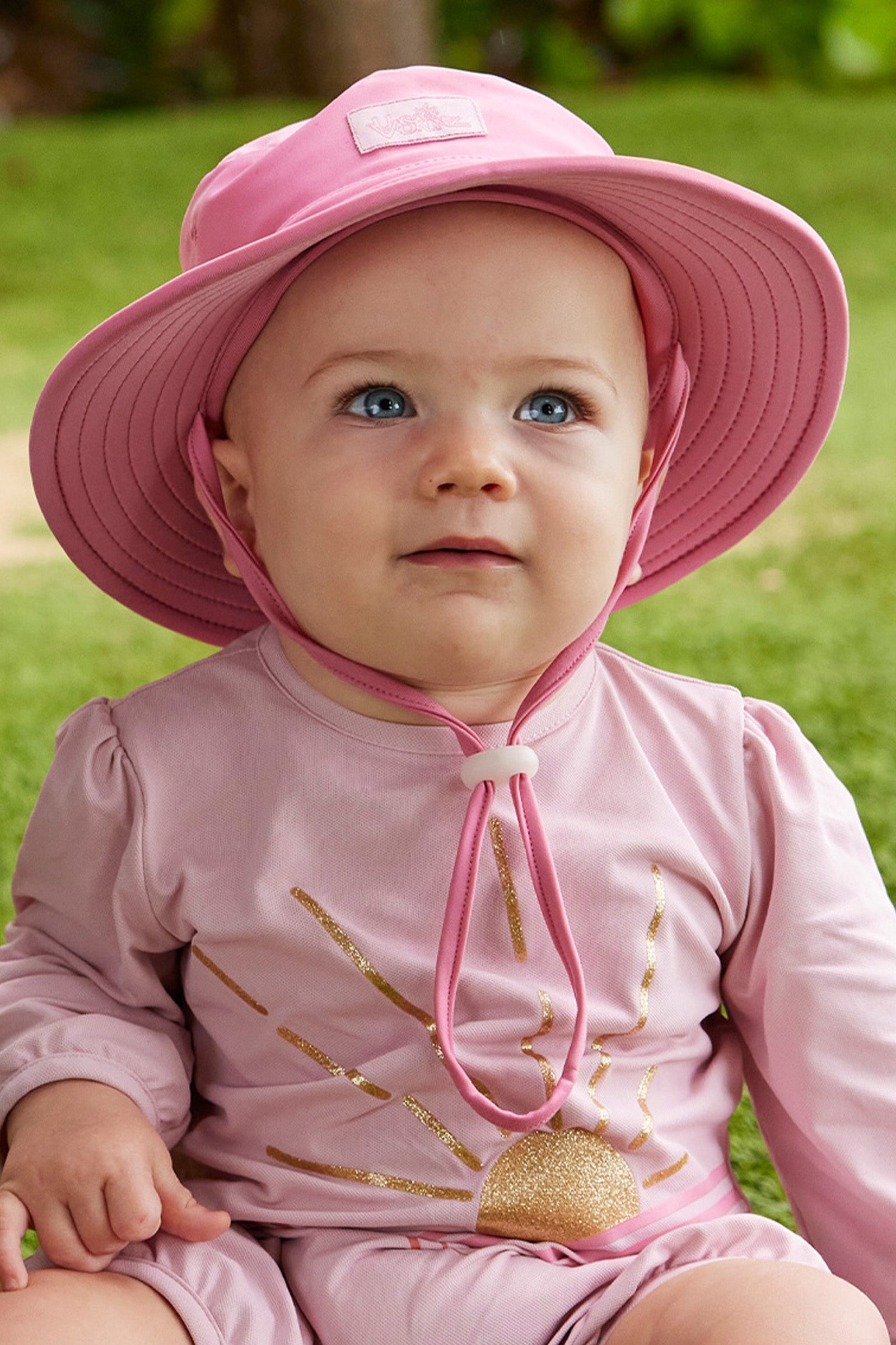 baby girl in swim hat|wild-rose