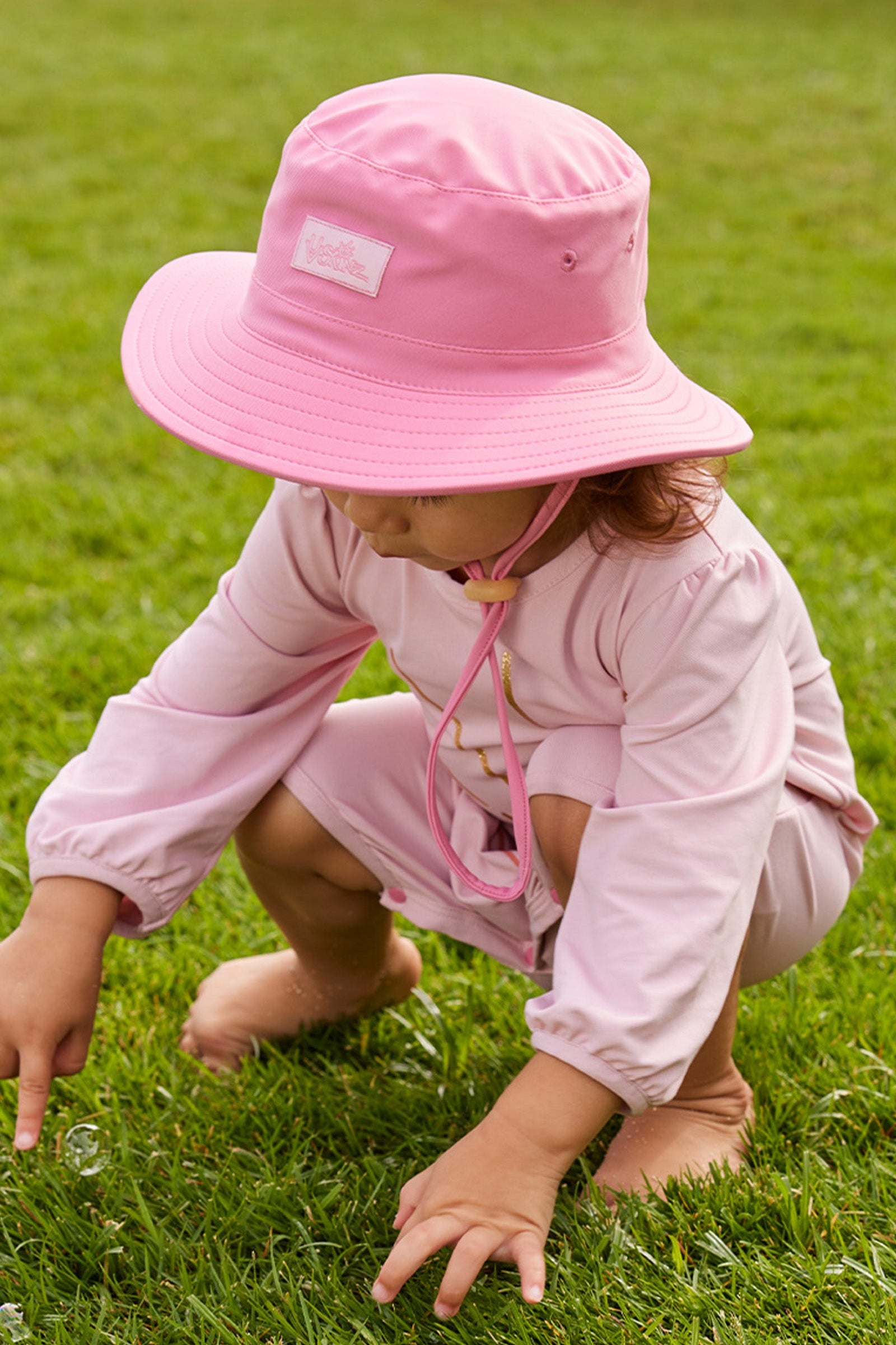 baby girl in swim hat|wild-rose