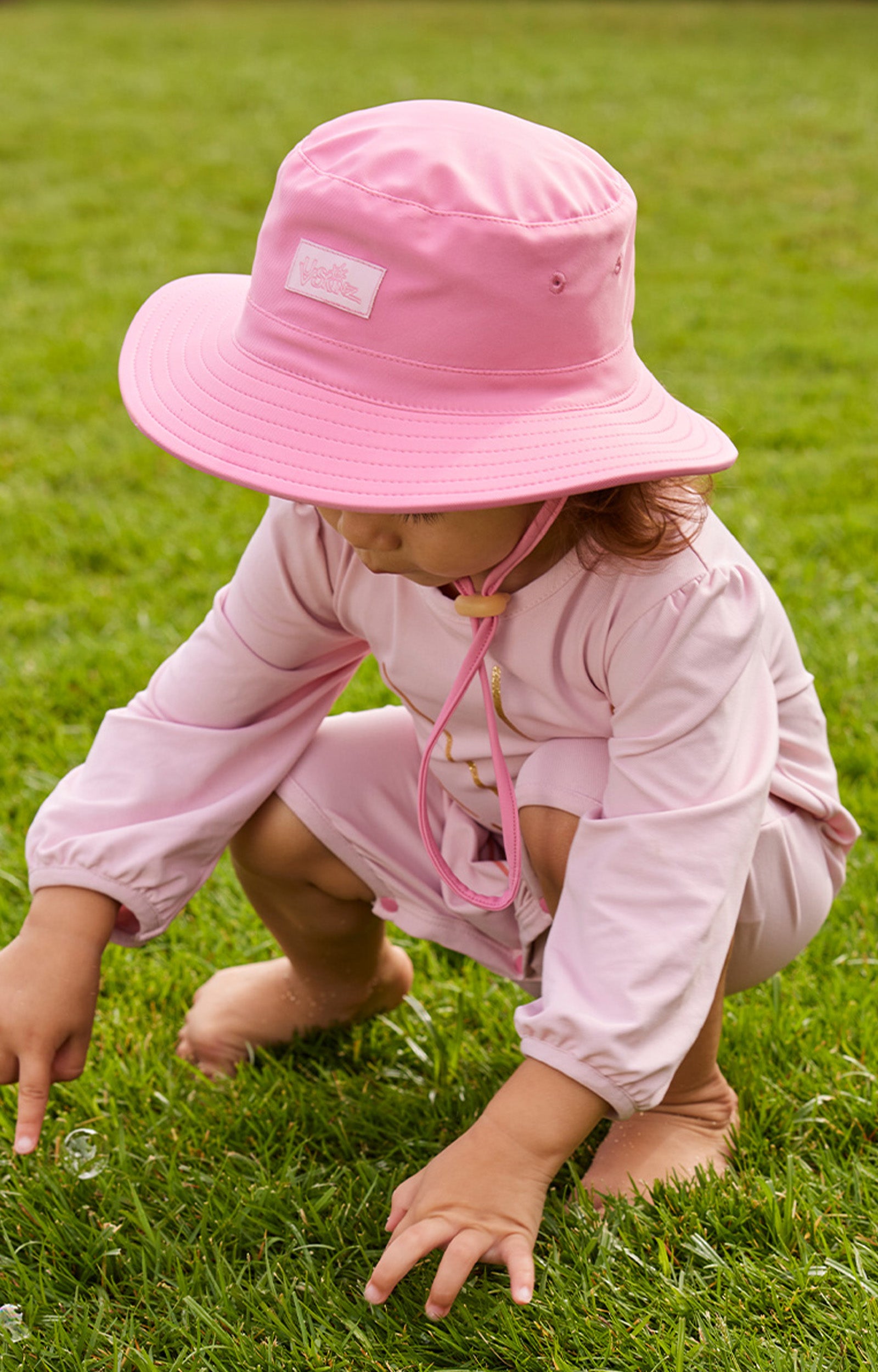 baby girl in swim hat|wild-rose