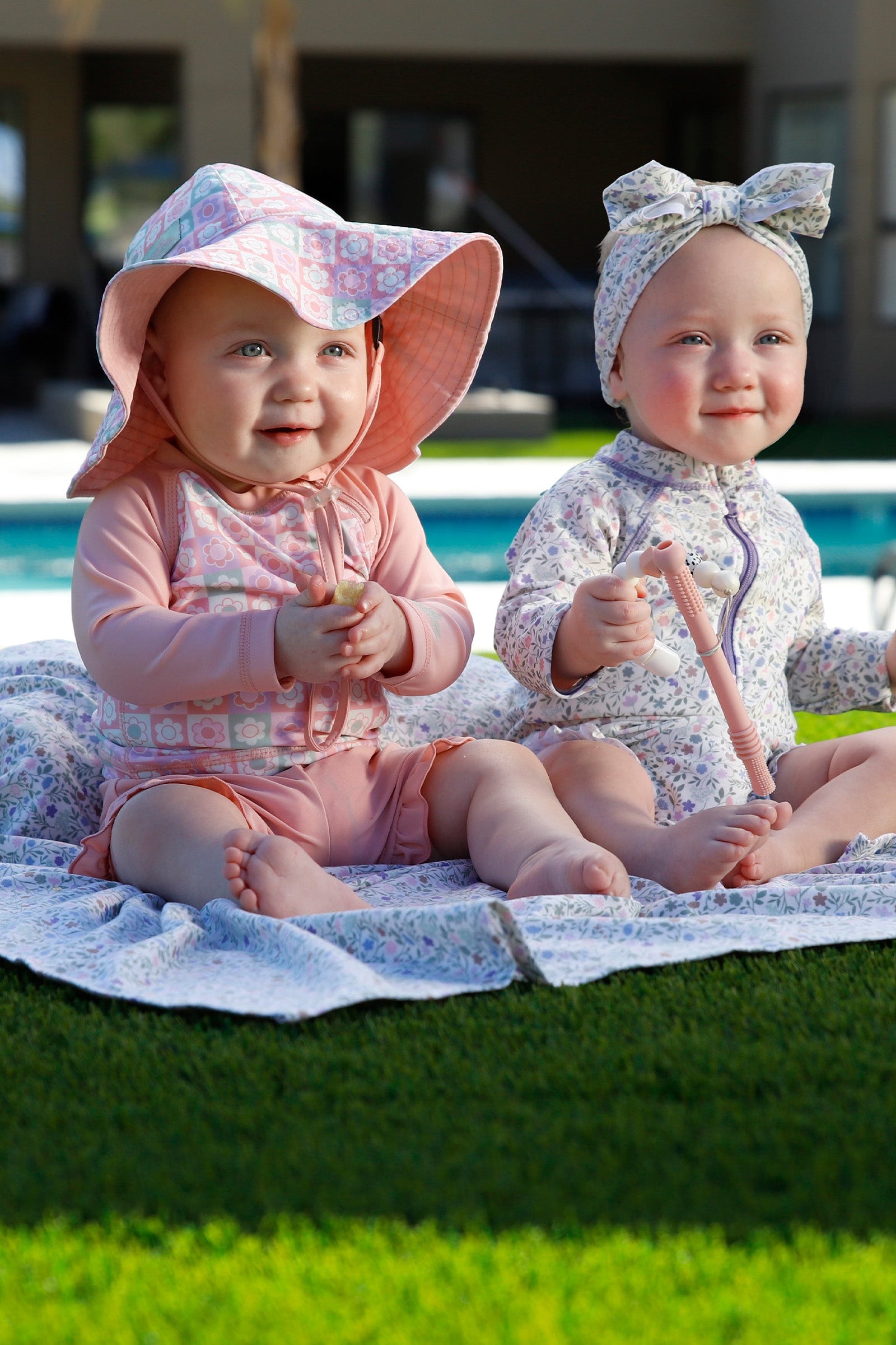 baby girl in scalloped bucket hat|tiled-flowers