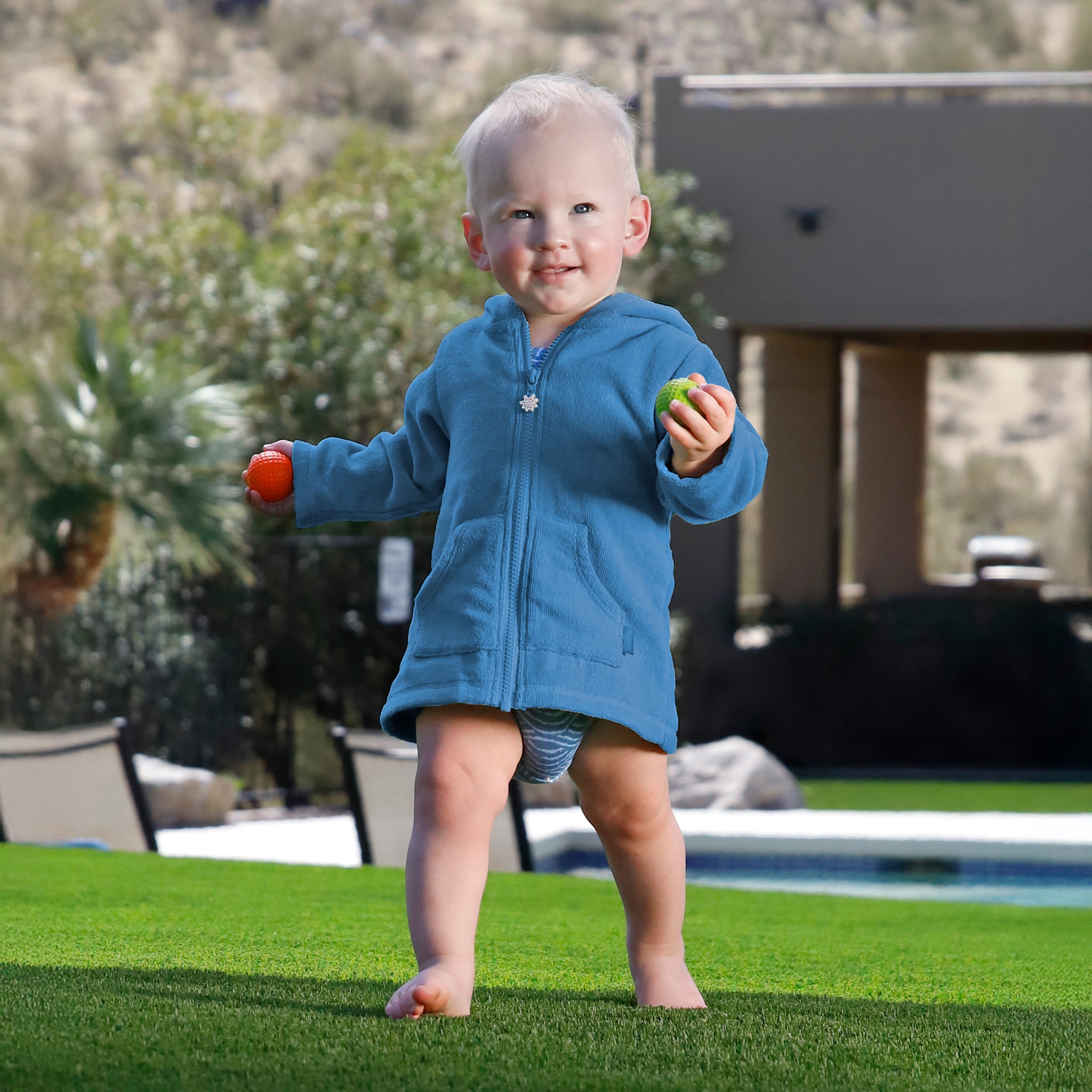 baby in hooded terry beach cover up|baltic