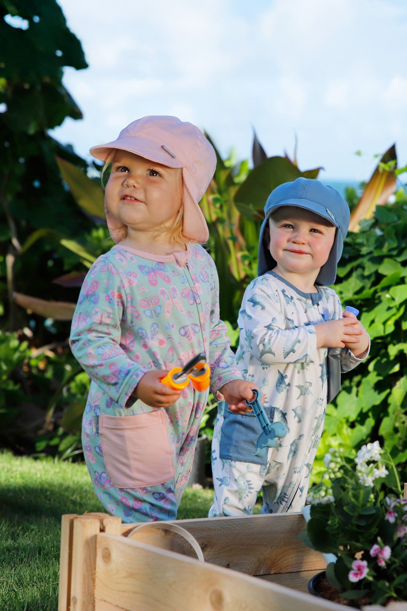 babies in everyday romper in garden in butterflies and watercolor dinos|watercolor-dinos