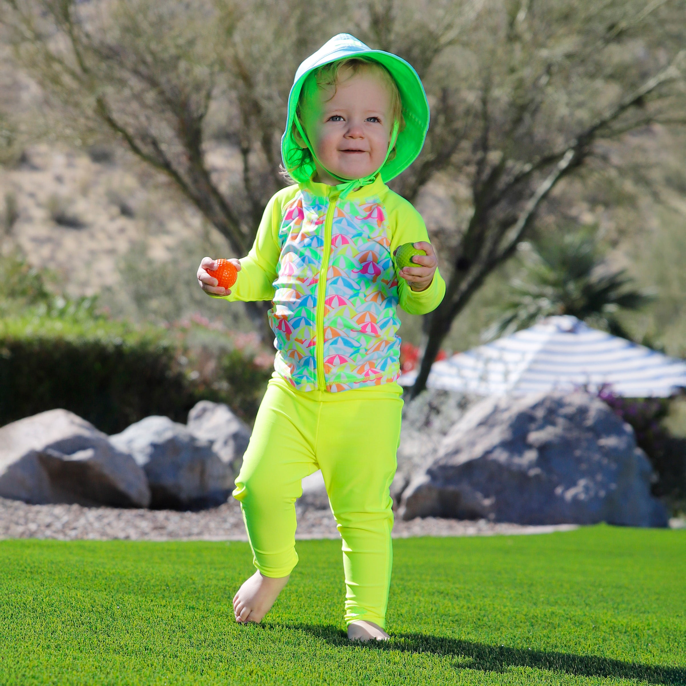baby in neon long sleeve full zip rashguard|neon-umbrellas