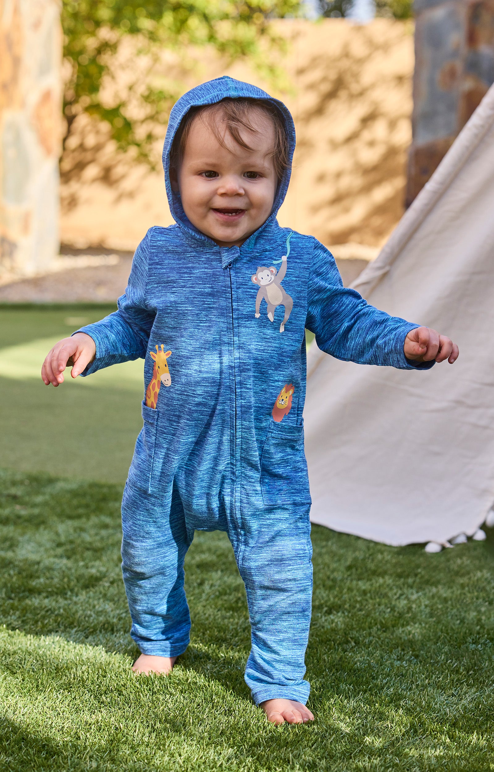 baby boy running in grass in everyday romper|radiant-rays