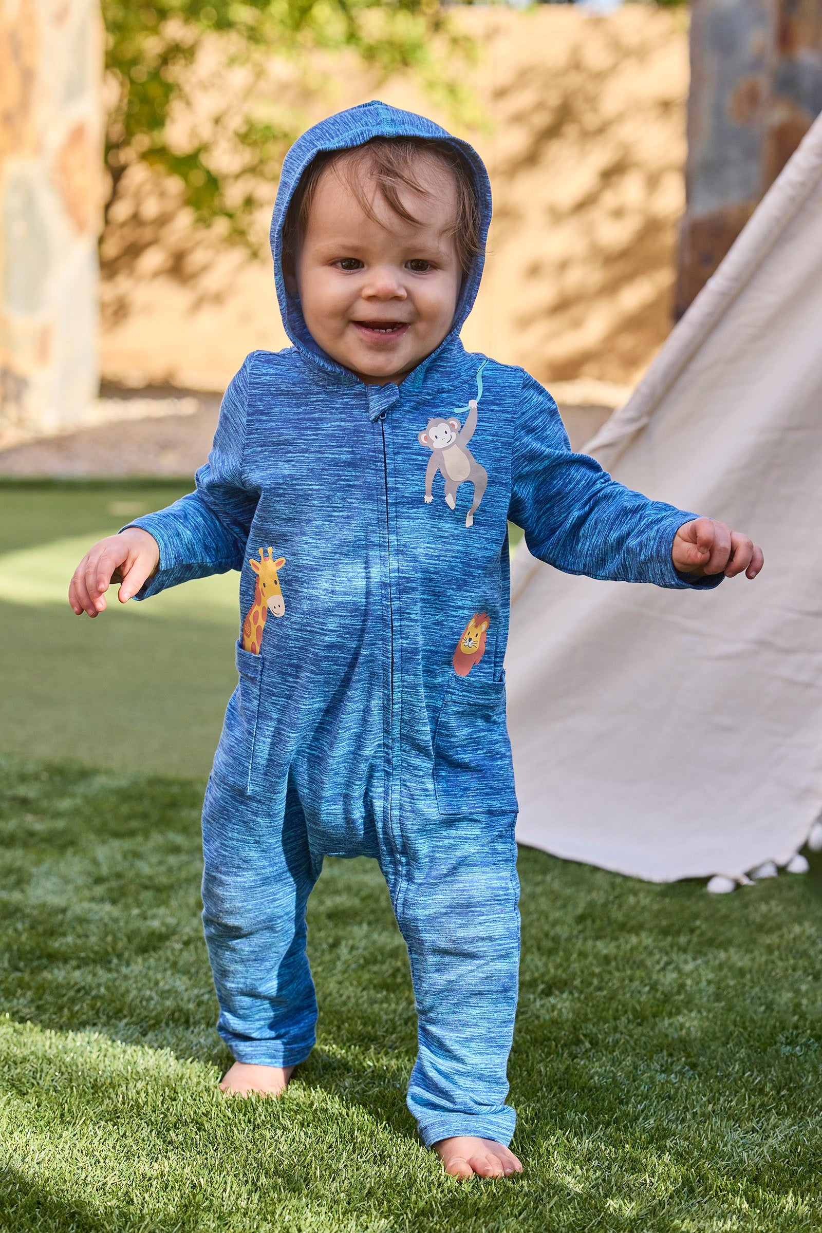 baby boy running in grass in everyday romper|radiant-rays