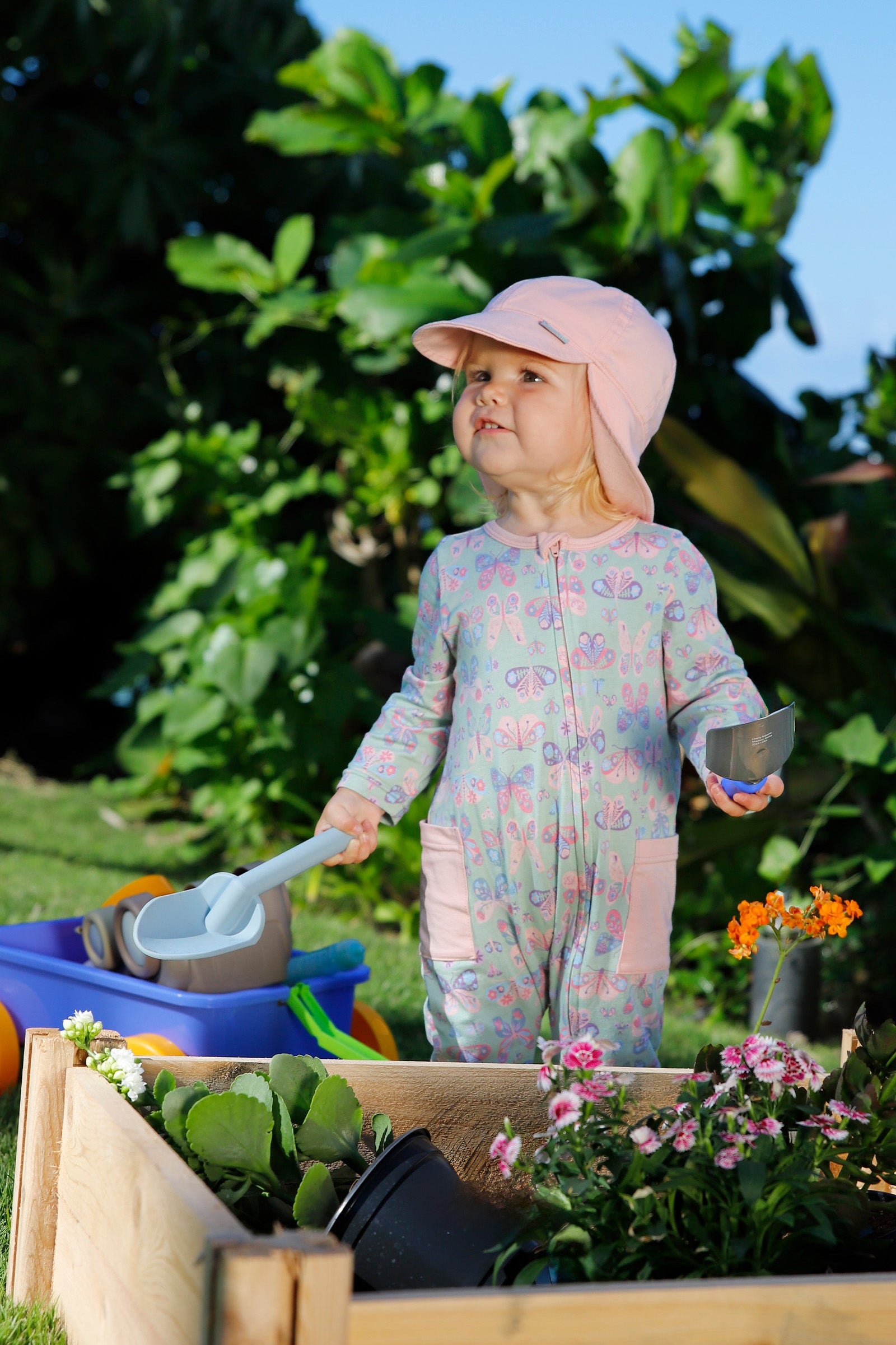baby gardening in everyday flap hat in dusty pink|dusty-pink
