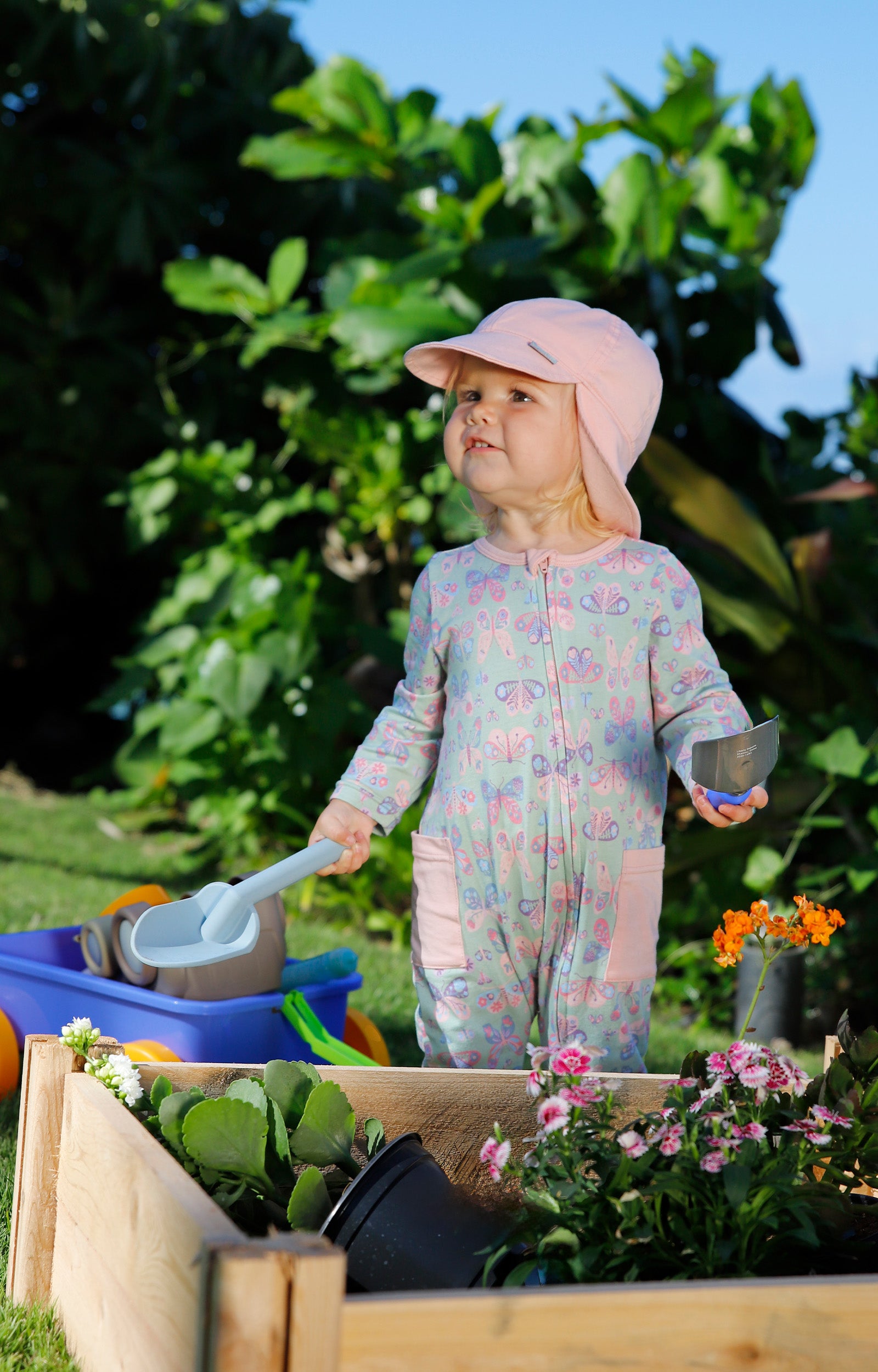 baby gardening in everyday flap hat in dusty pink|dusty-pink