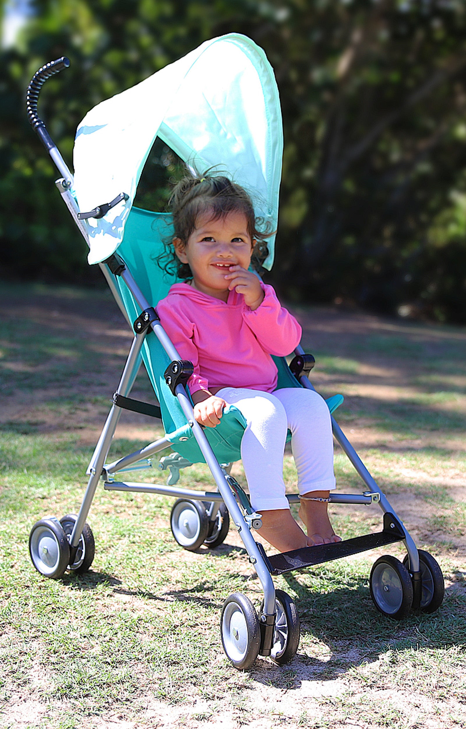 Baby Girl in Stroller in UV Skinz's Baby Bamboo Sun Legz™ in White|white