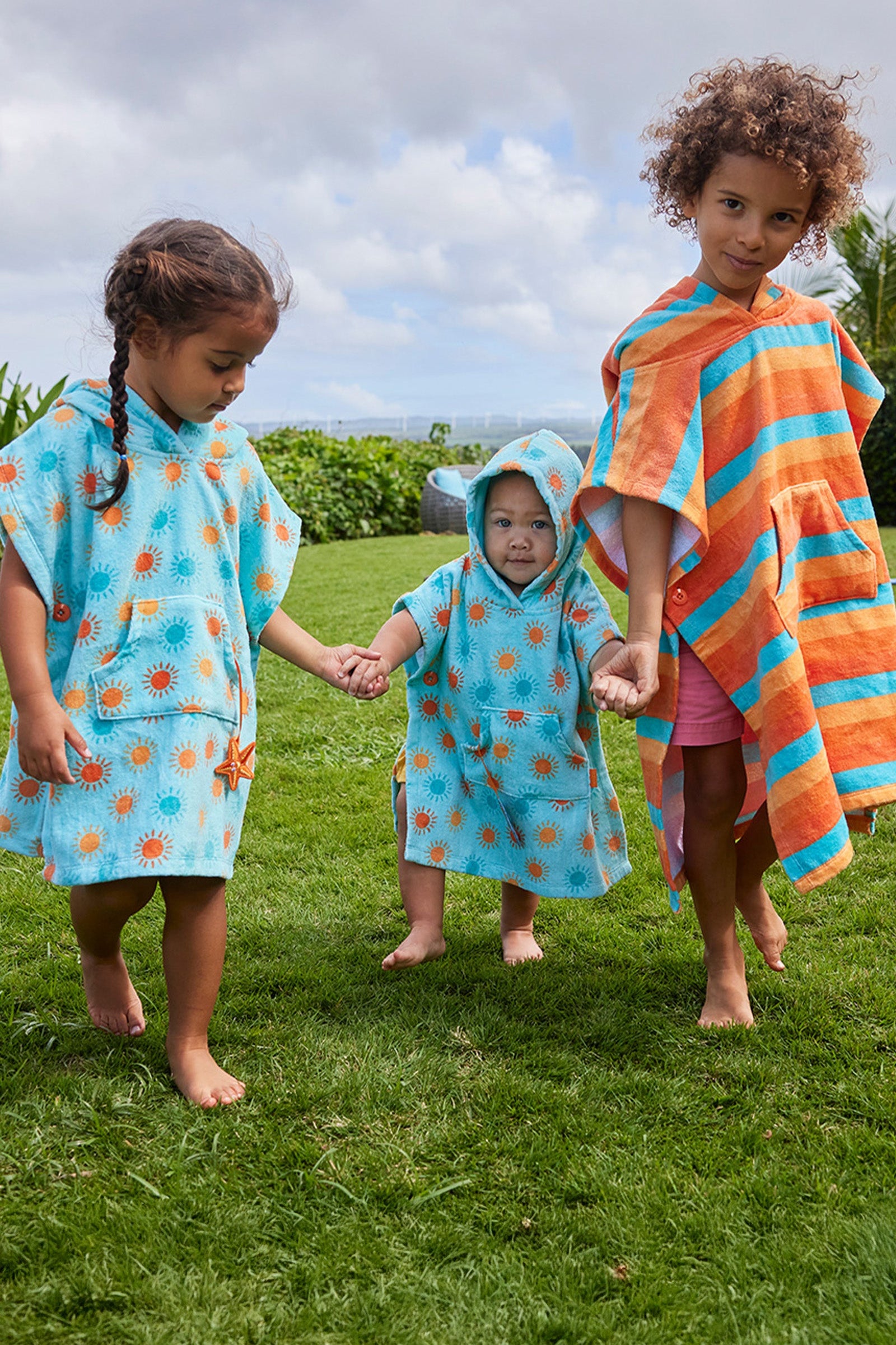 kids running in hooded beach poncho|sunset-stripe