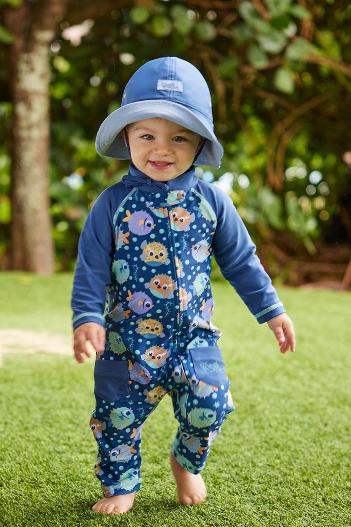 baby boy running in sun & swim suit|bubble-fishies