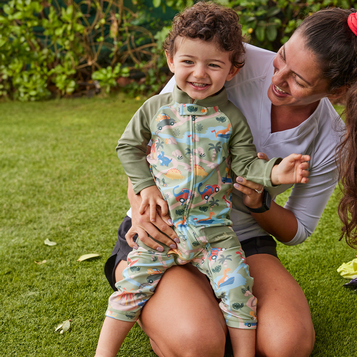 baby boy with his mom in sun & swim suit|dinoville