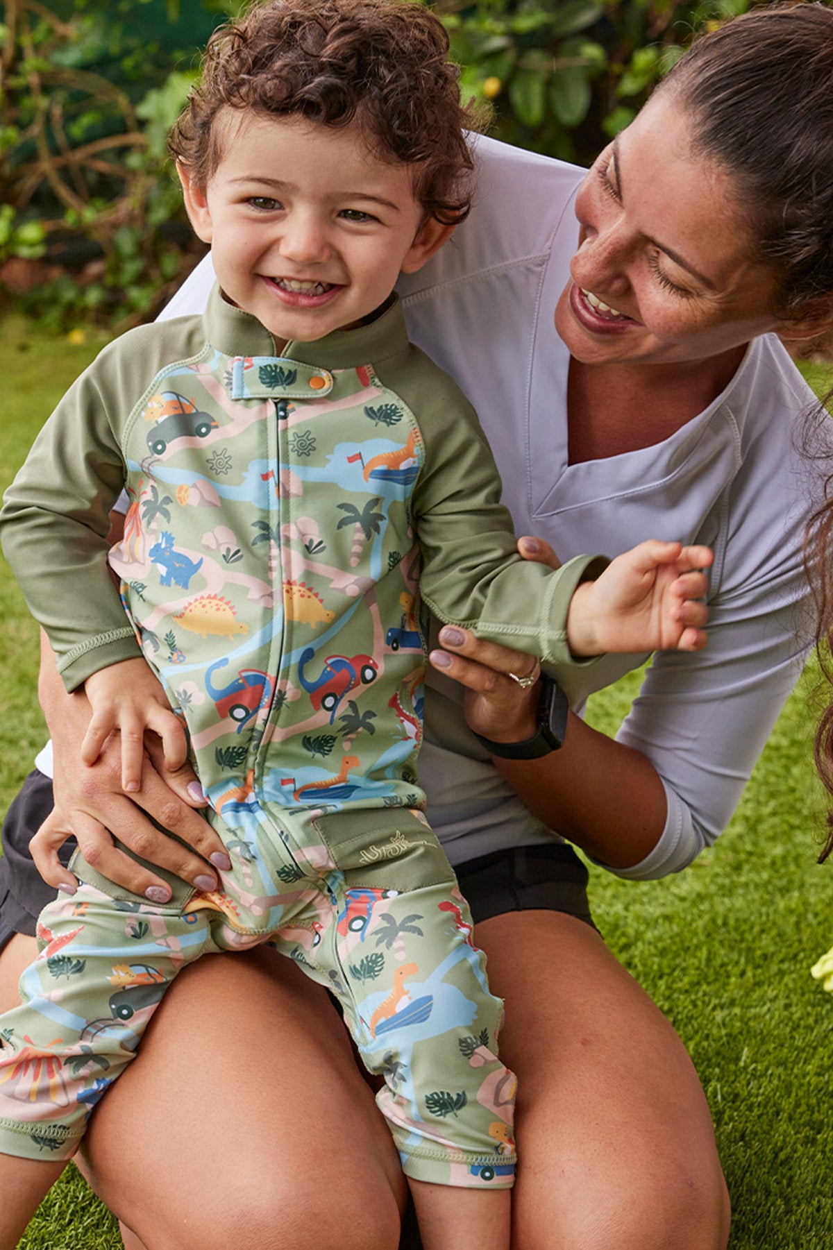 baby boy with his mom in sun & swim suit|dinoville