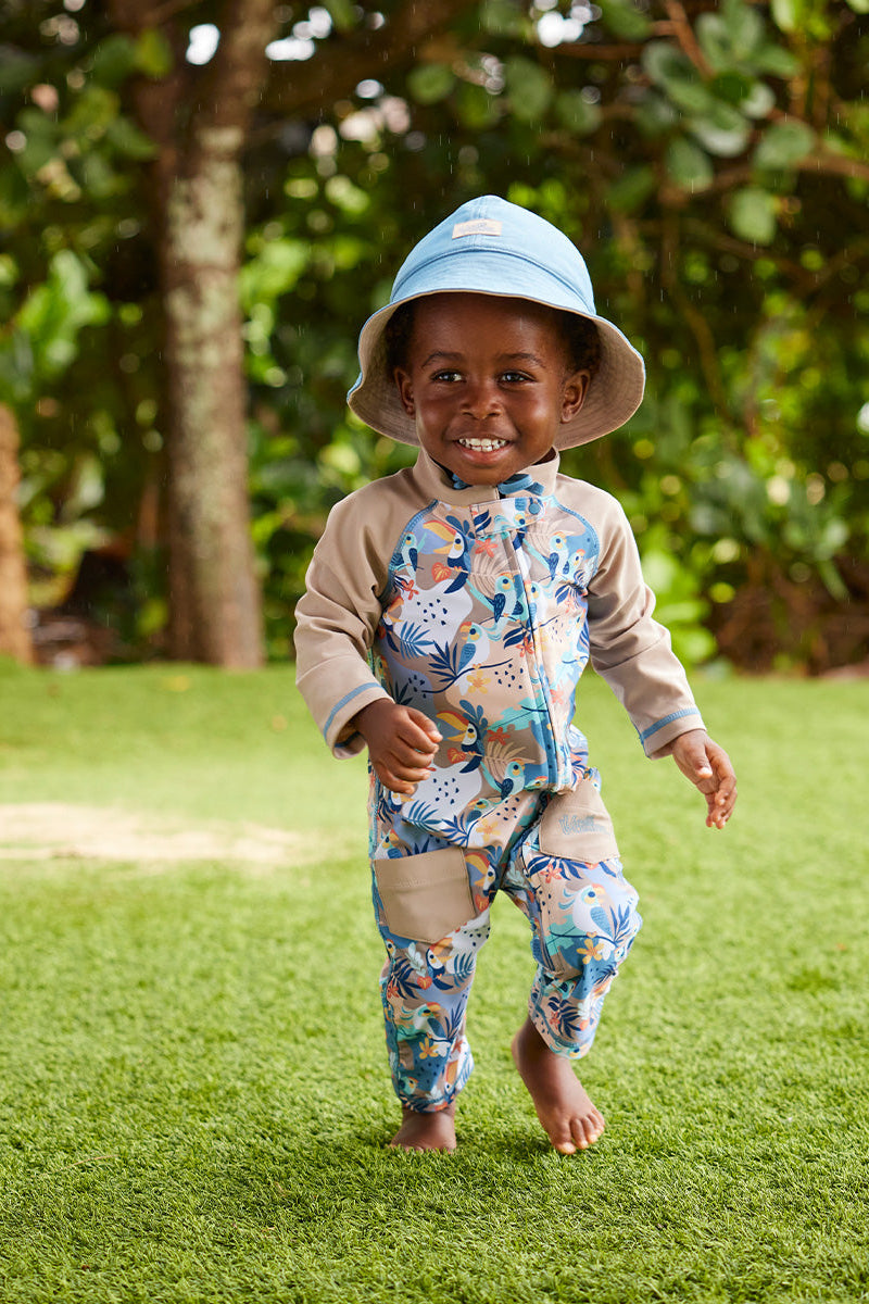 baby boy running in sun & swim suit|toucan-tropics