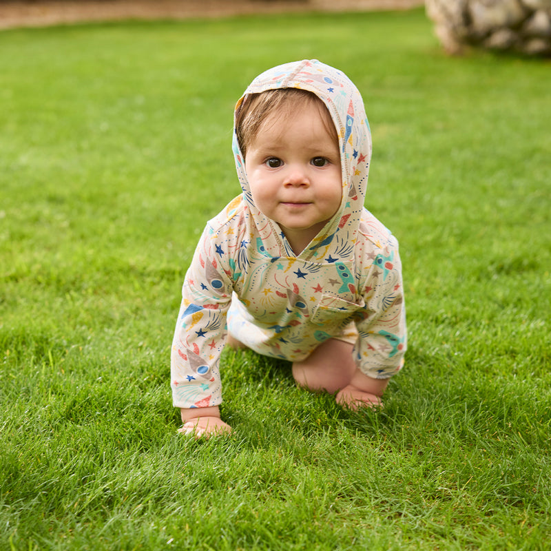 baby boy crawling in grass in hooded sunzie|rocket-jam