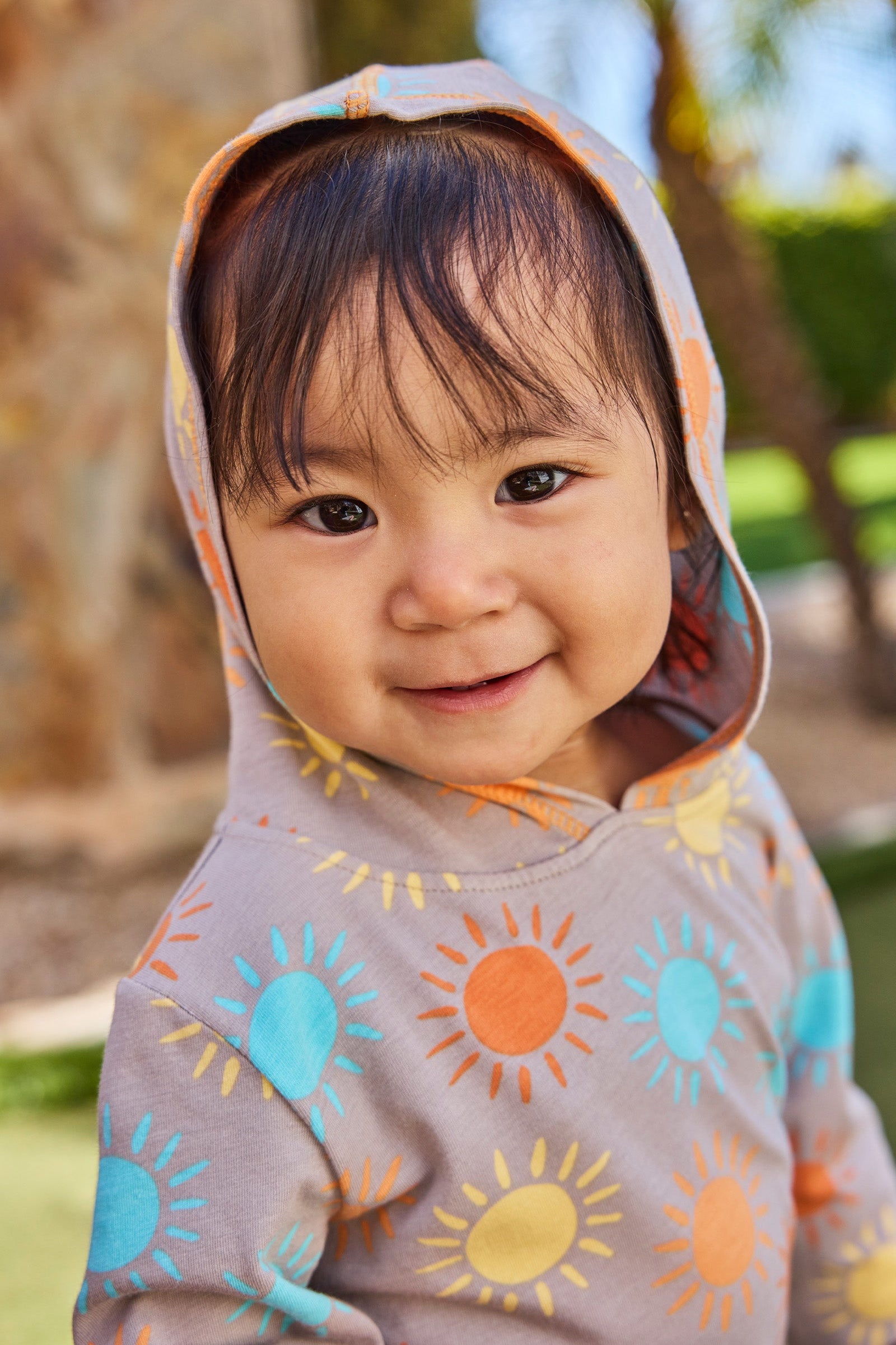 baby girl in hooded sunzie