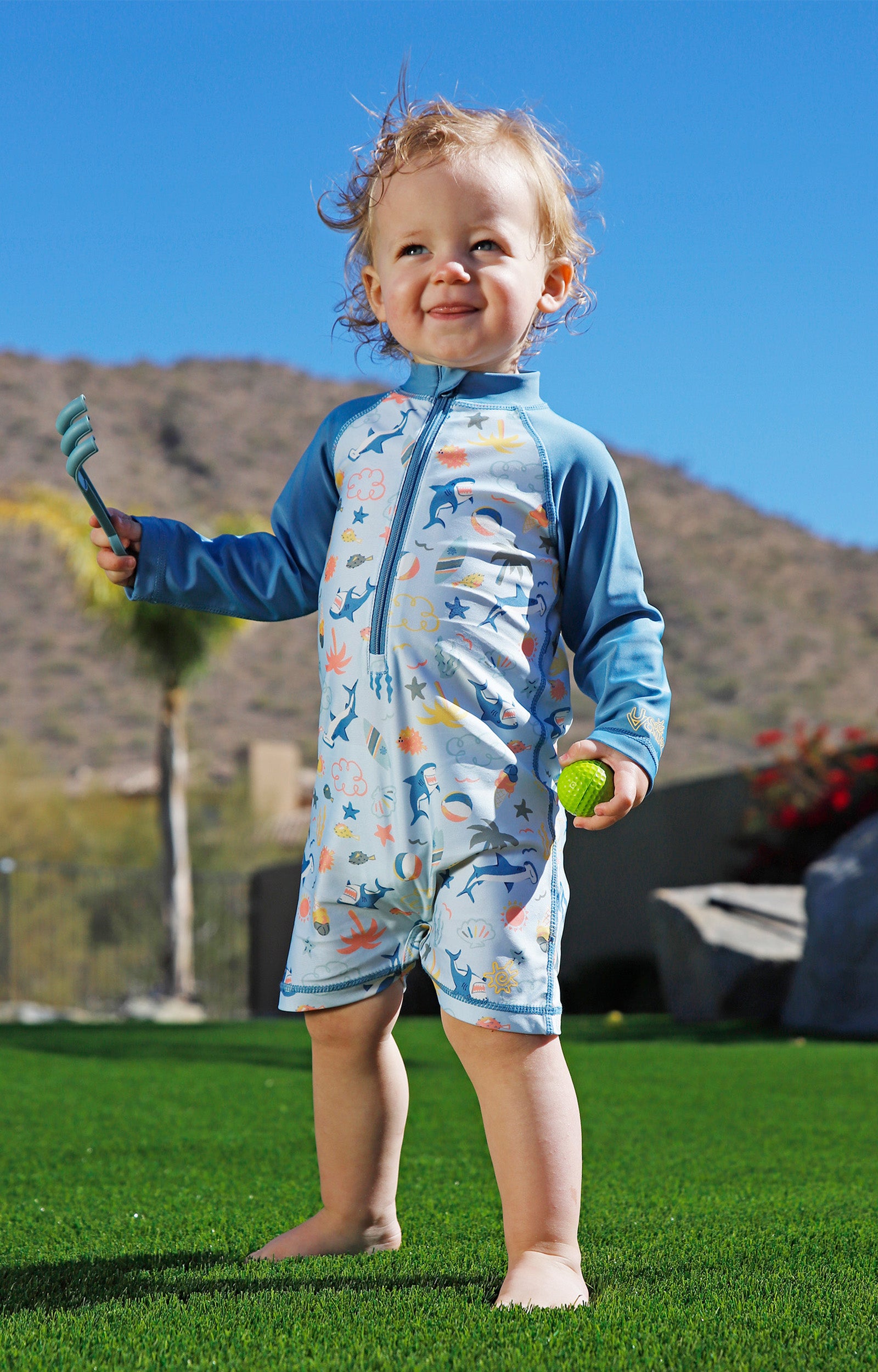 baby in long sleeve swim romper|sharks-cove