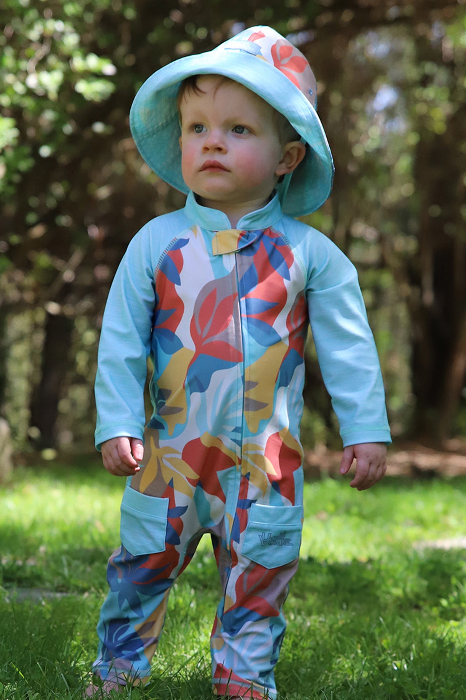 baby in reversible sun hat|beach-picasso