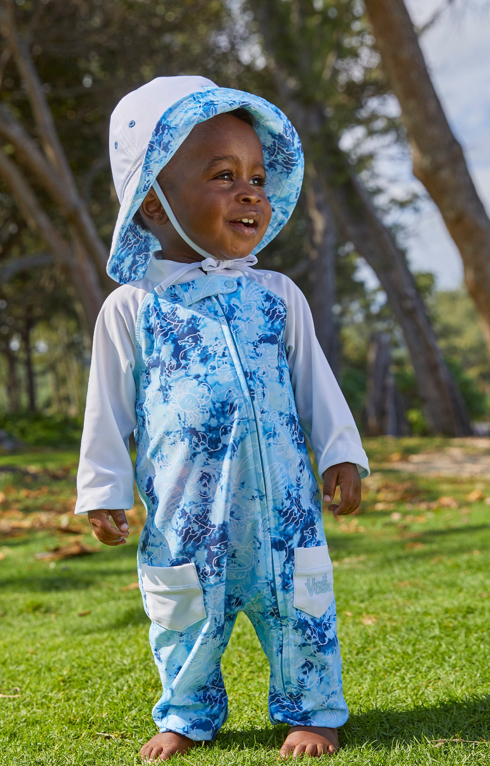 baby boy in UV Skinz's baby boy's sun hat in sea friends|sea-friends