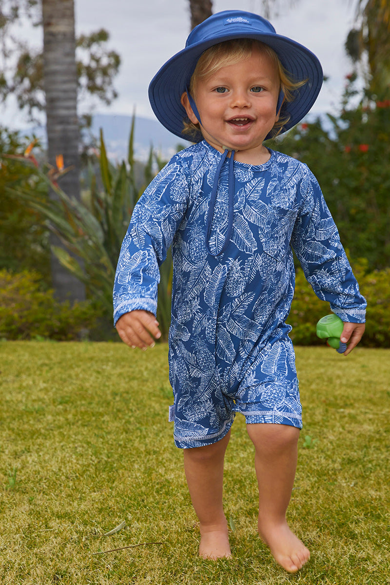 Baby boy in UV Skinz's baby boy's swim hat in washed navy|washed-navy