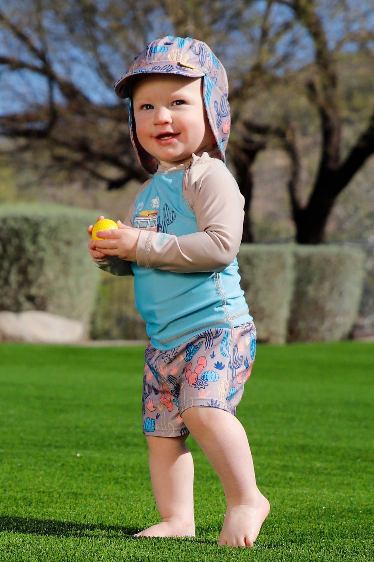 baby in swim flap hat|cactus-crowd