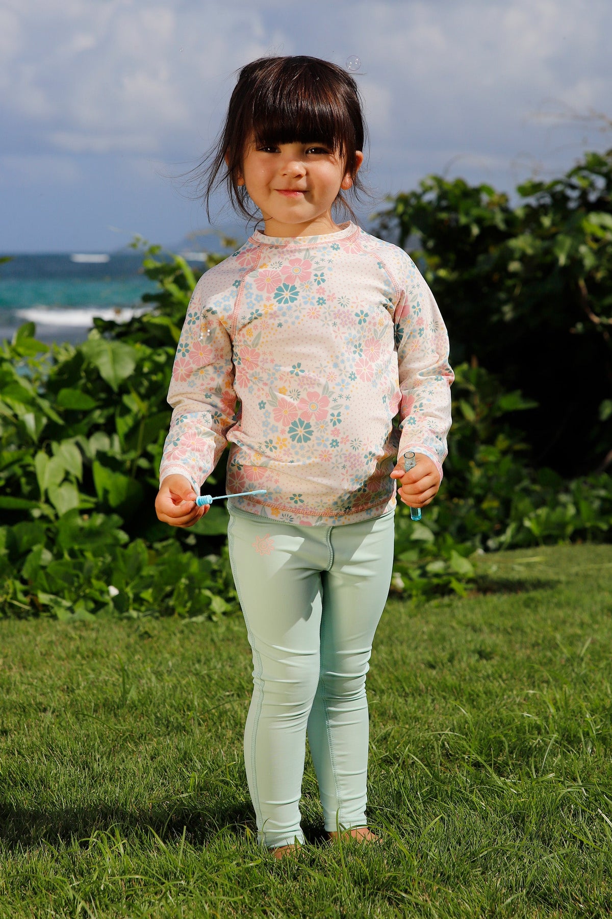 girl with bubbles in active sport swim leggingz in dewdrop|dewdrop