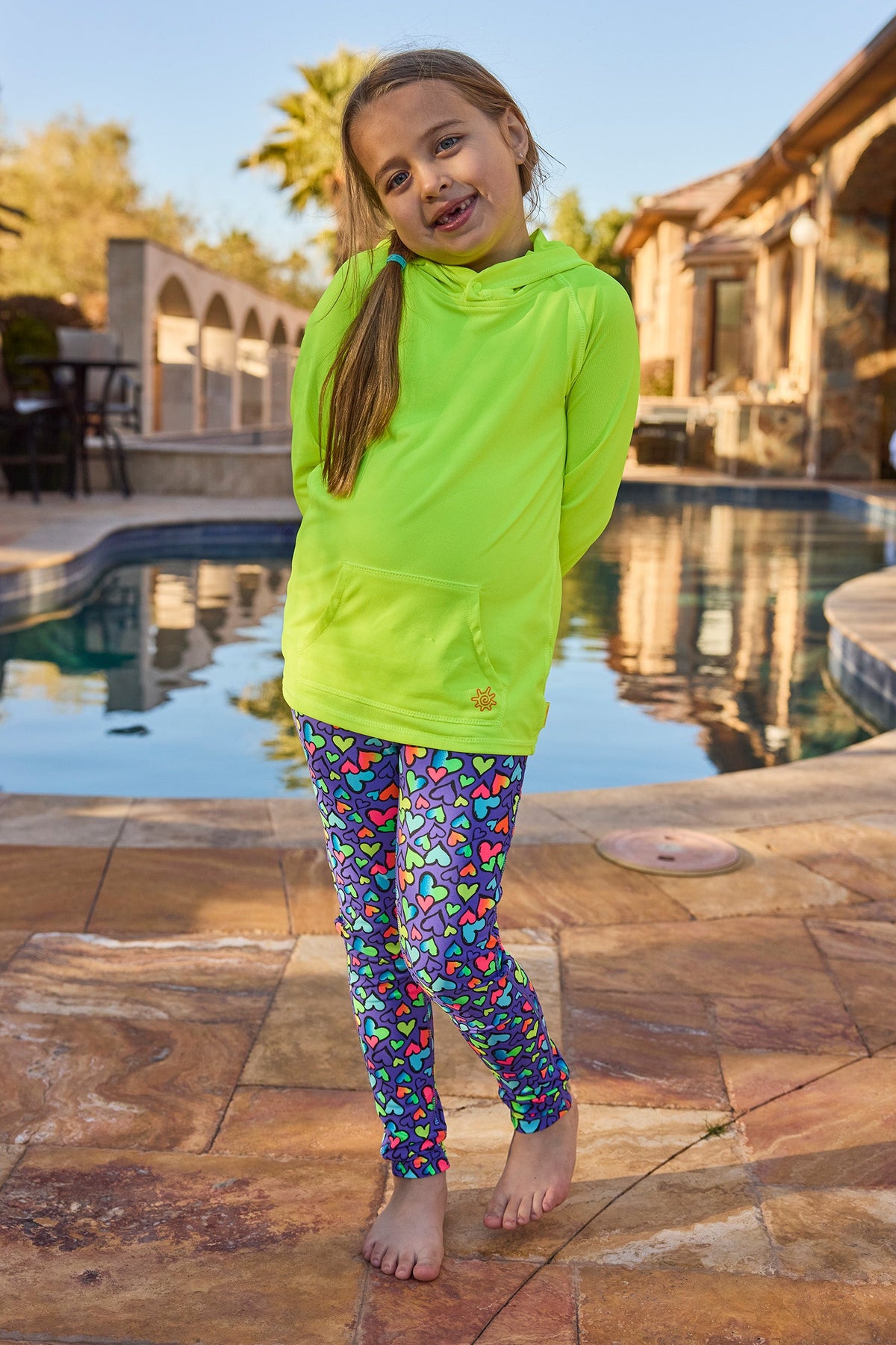 girl by pool in neon upf active sport swim tights|neon-hearts