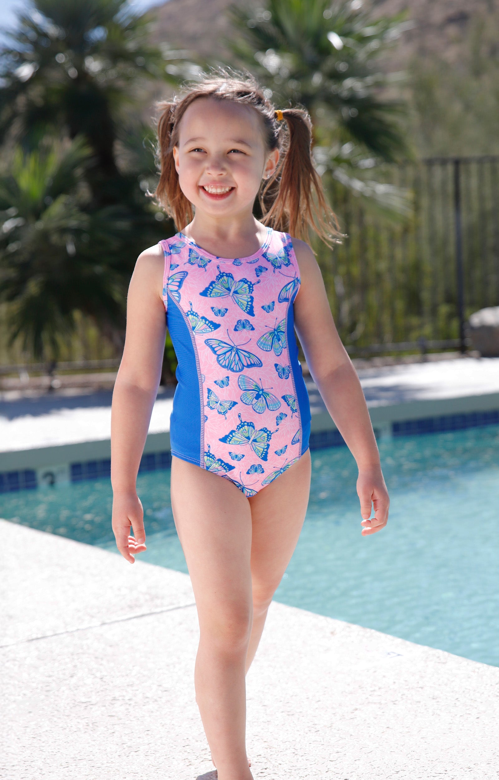 girl having fun by pool in girls 2 piece swimsuit shrug set|sunlit-wings