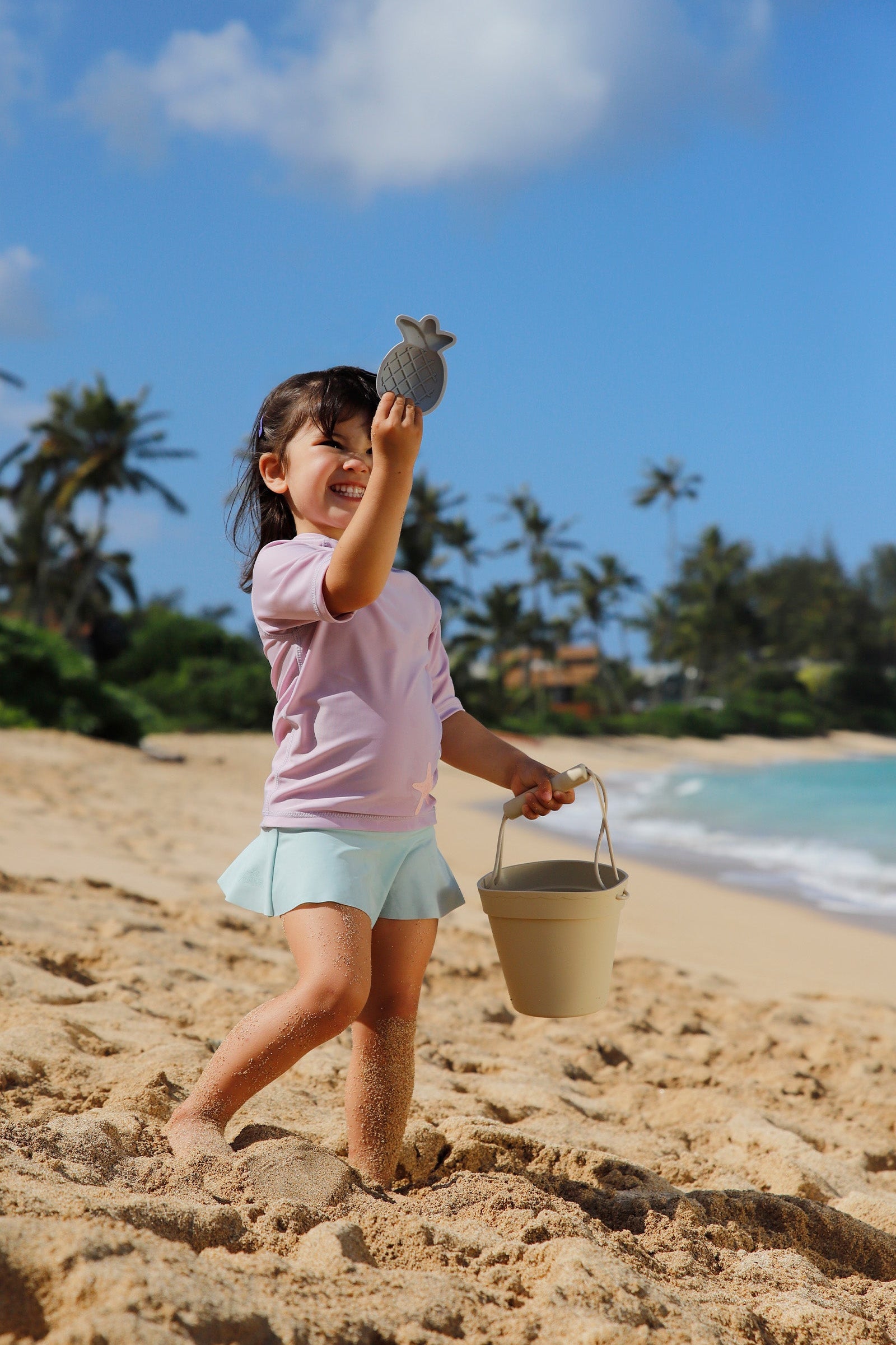 girl playing on the beach in flounce skirt in dewdrop|dewdrop