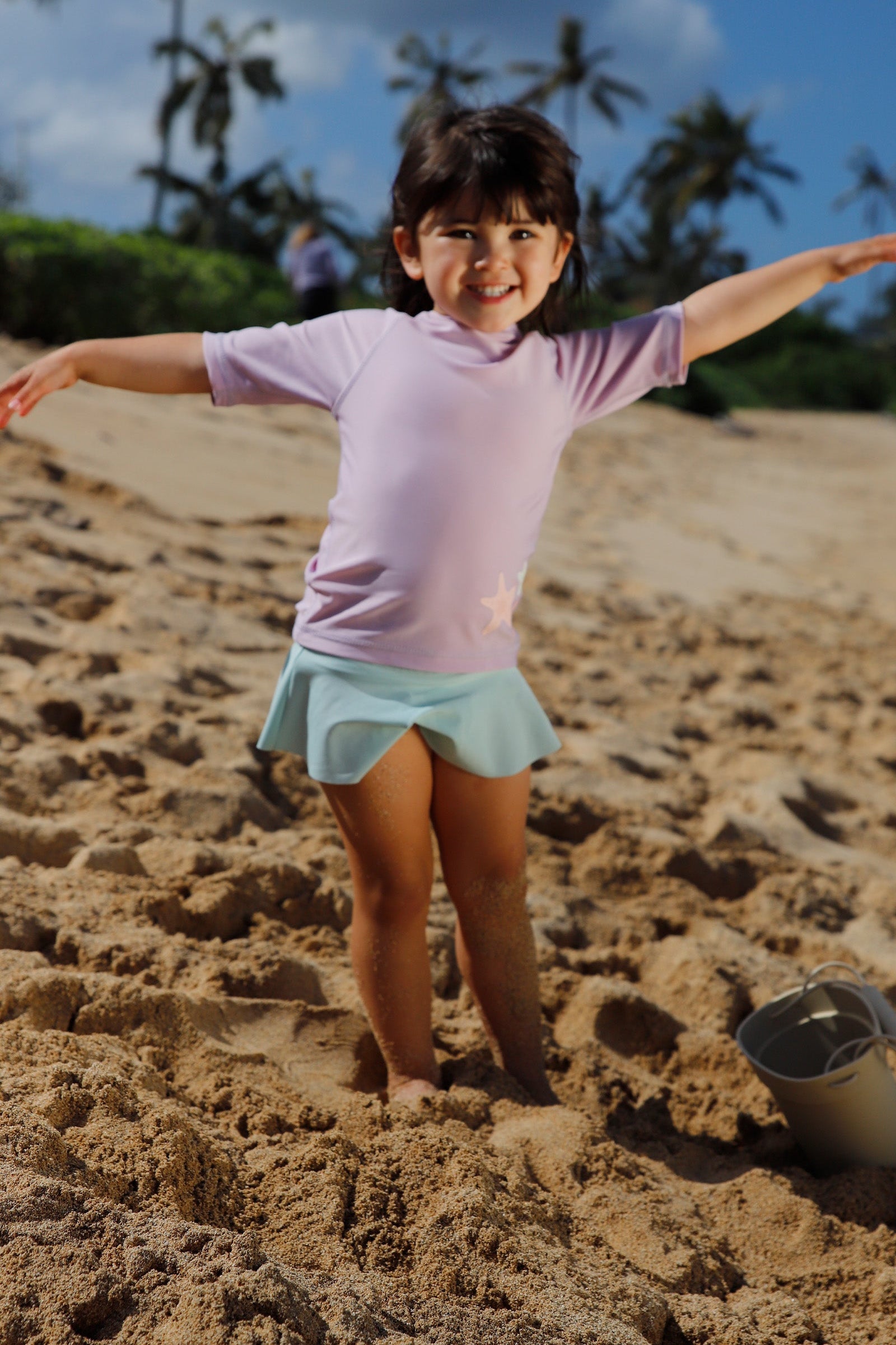 girl on the beach in short sleeve crew sunny swim shirt|starfish-tide