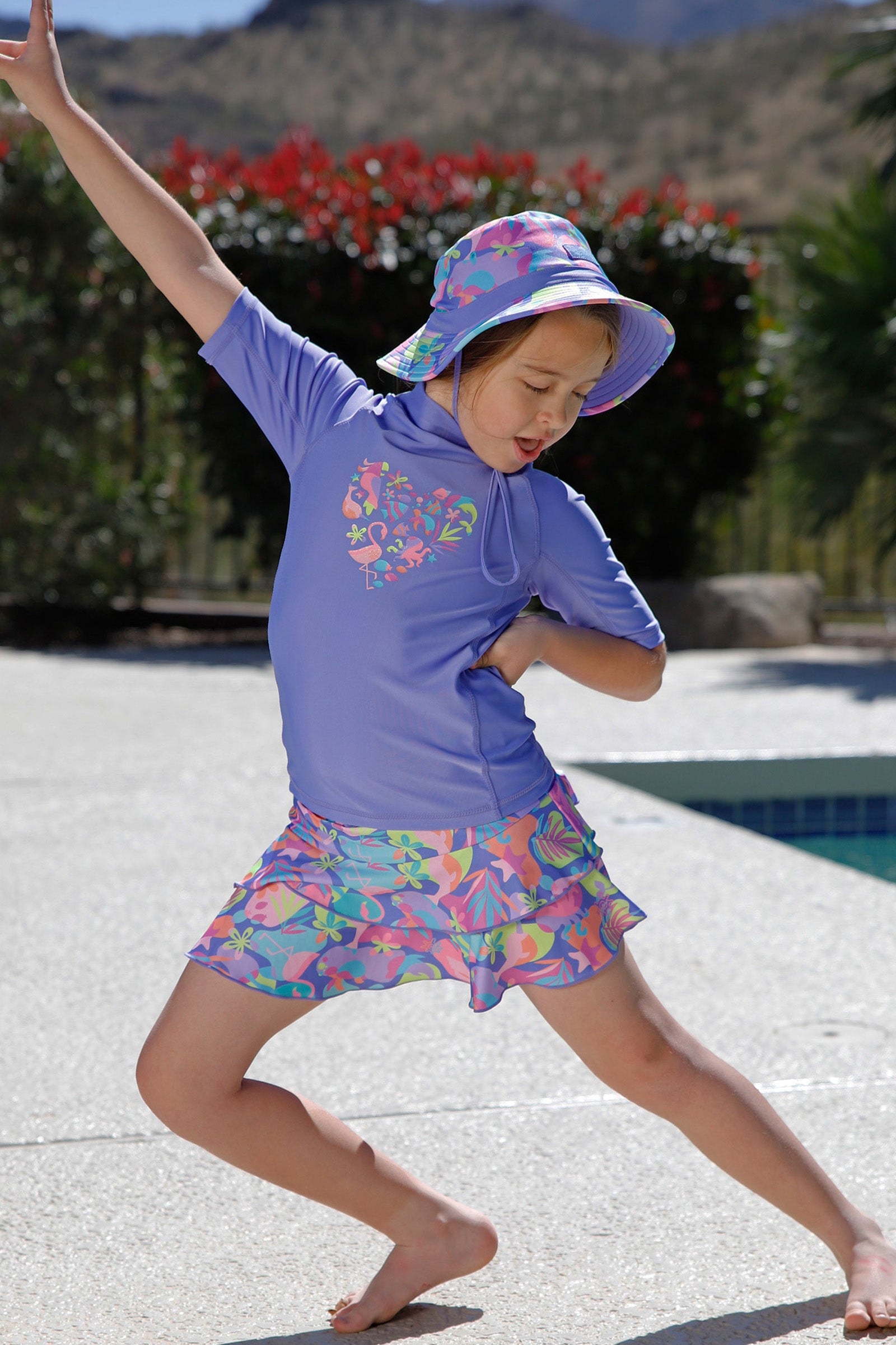 girl dancing by pool in girls sunny swim skirt|hidden-friends