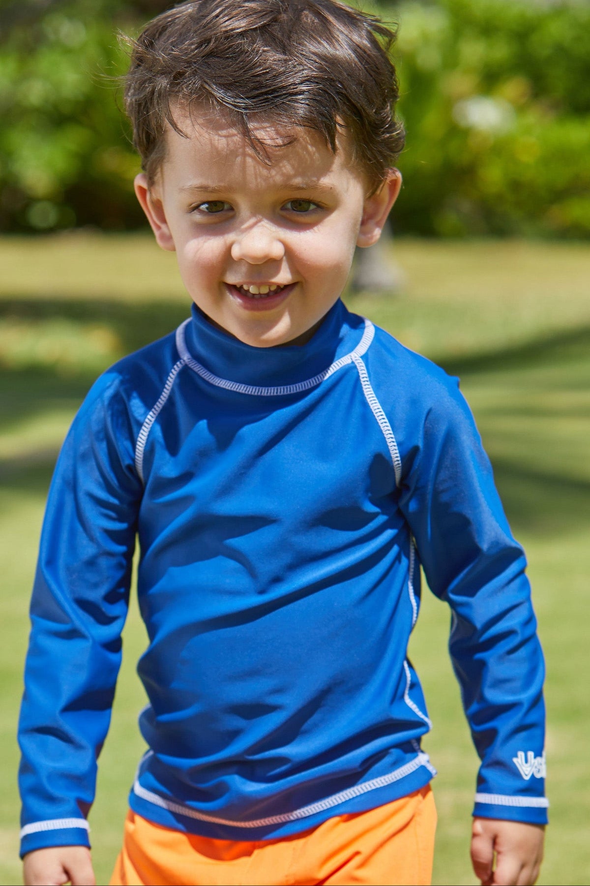 Little boy in the kid's long sleeve swim shirt in navy|navy