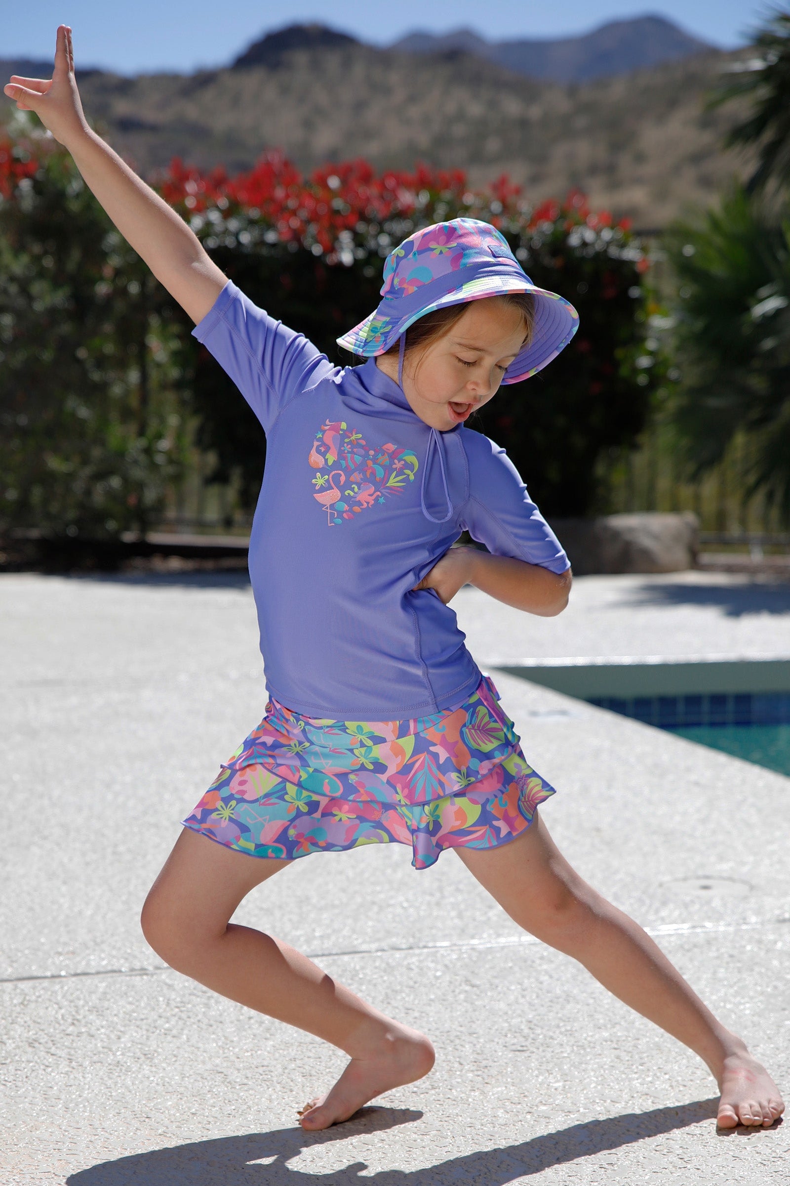 girl dancing by pool in girls sunny swim skirt|hidden-friends