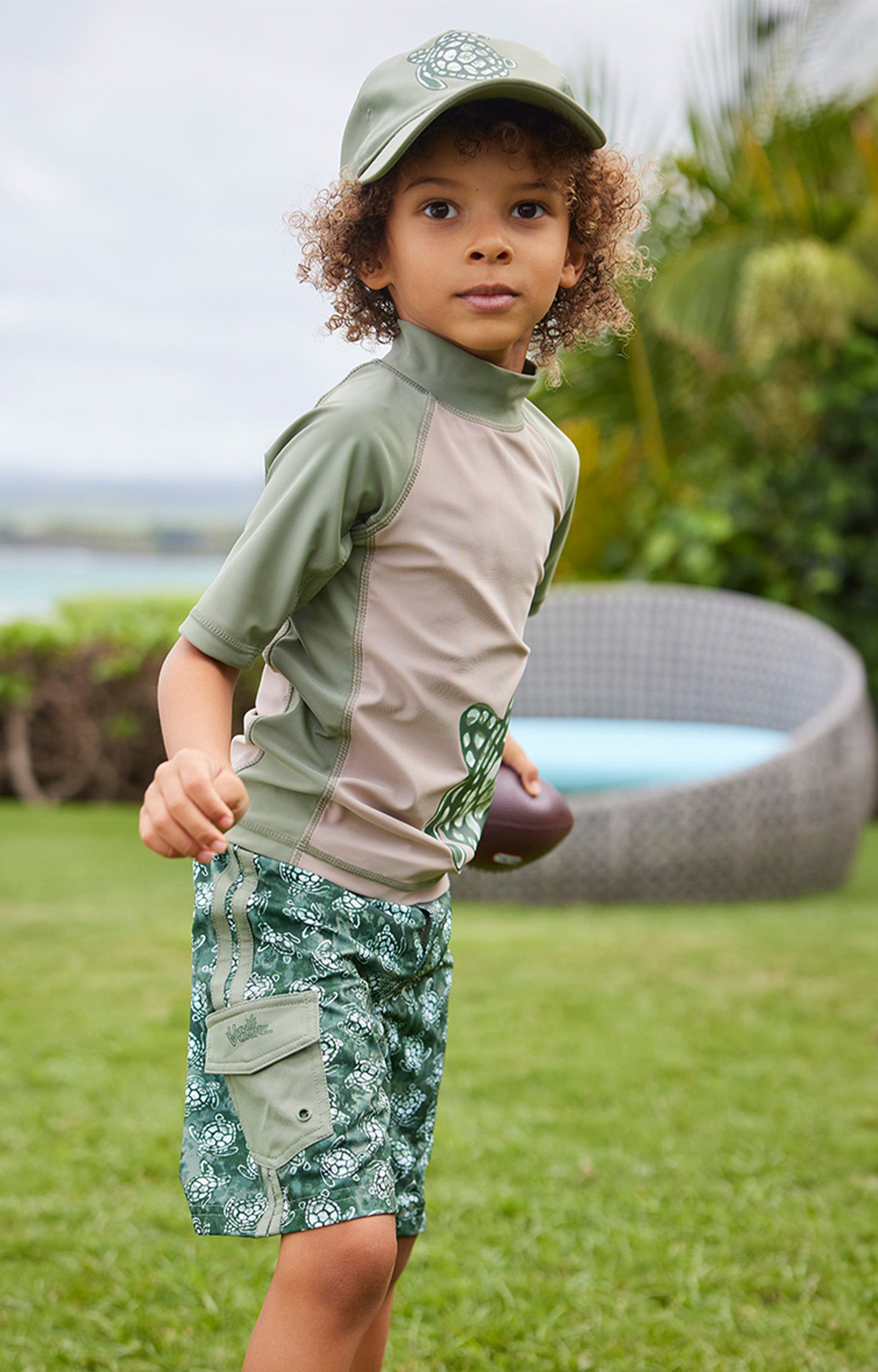 boys in racer stripe board shorts|turtle-cove
