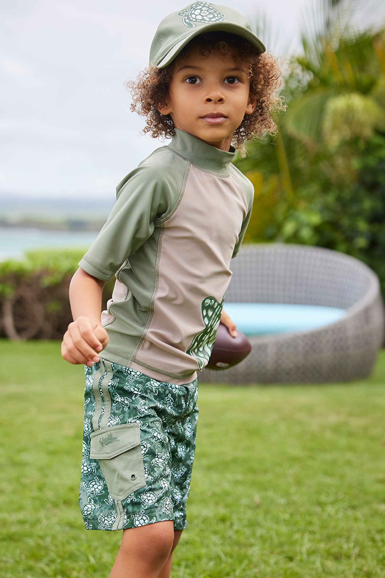 boys in racer stripe board shorts|turtle-cove