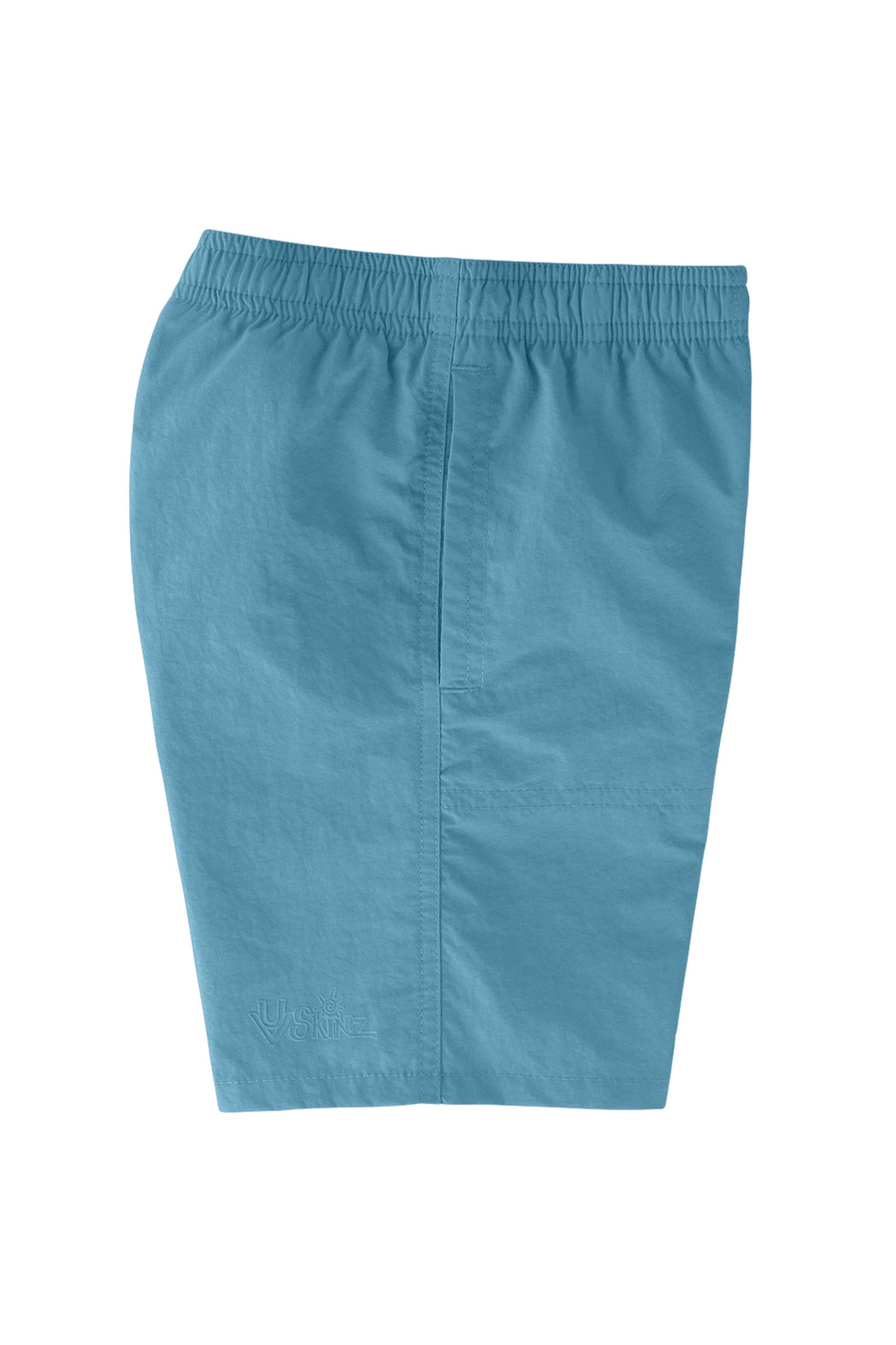 side view of the boys beach shorts in lagoon|lagoon