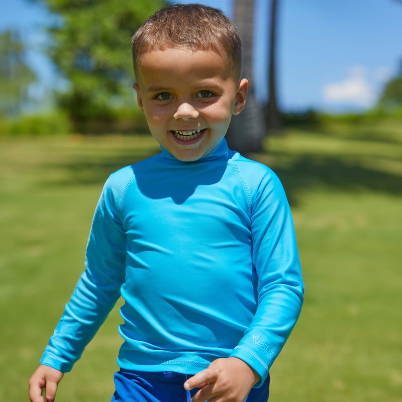 Little boy in the kid's long sleeve swim shirt in aqua|aqua