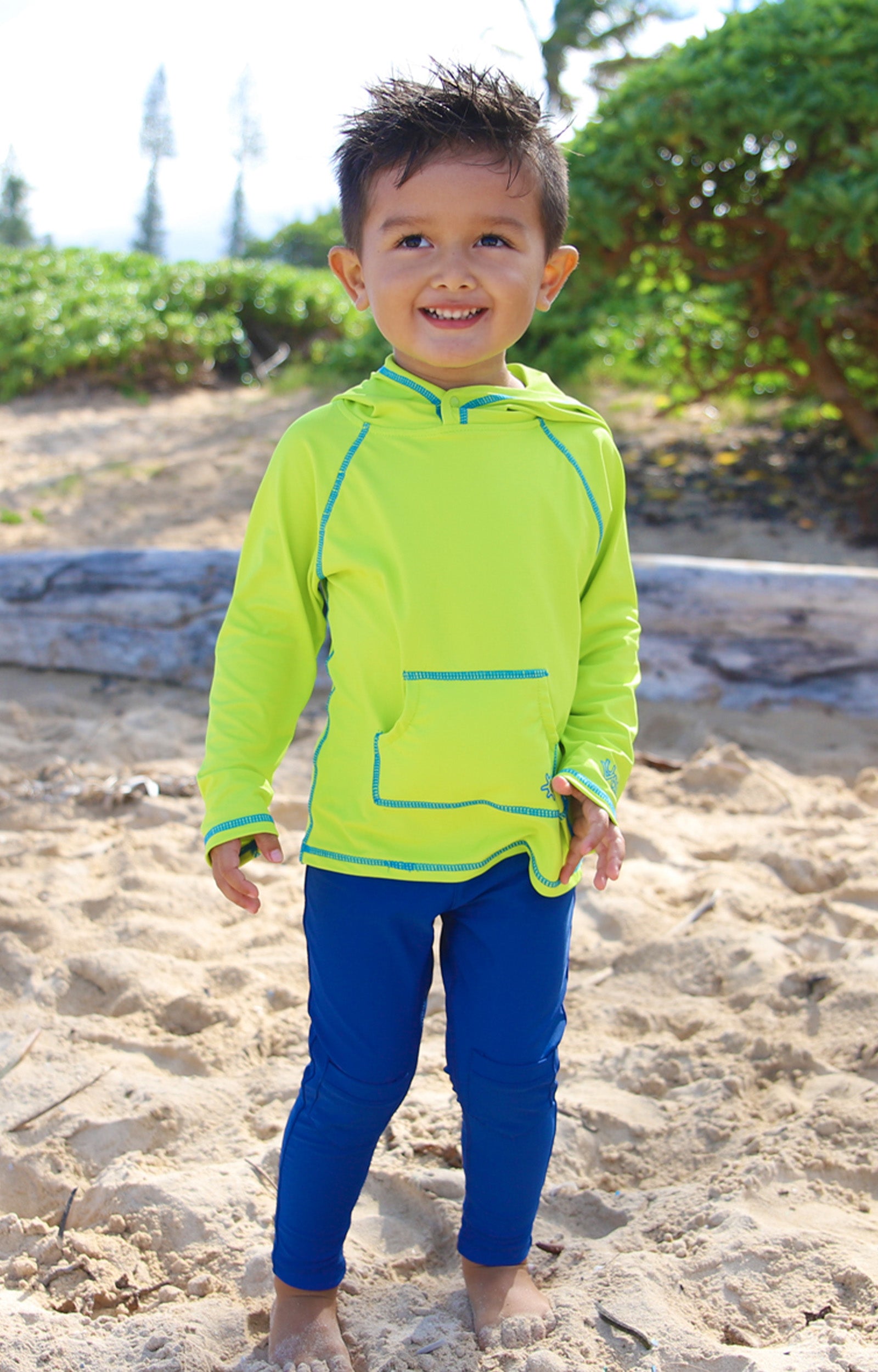 Little boy in UV Skinz's boy's pullover hoodie in lime punch|lime-punch