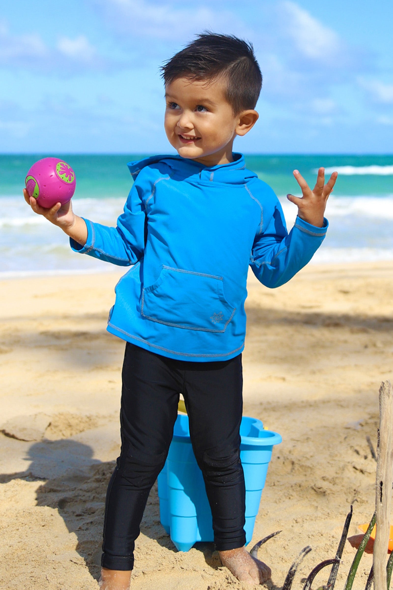 Little boy in UV Skinz's boy's pullover hoodie in royal|royal